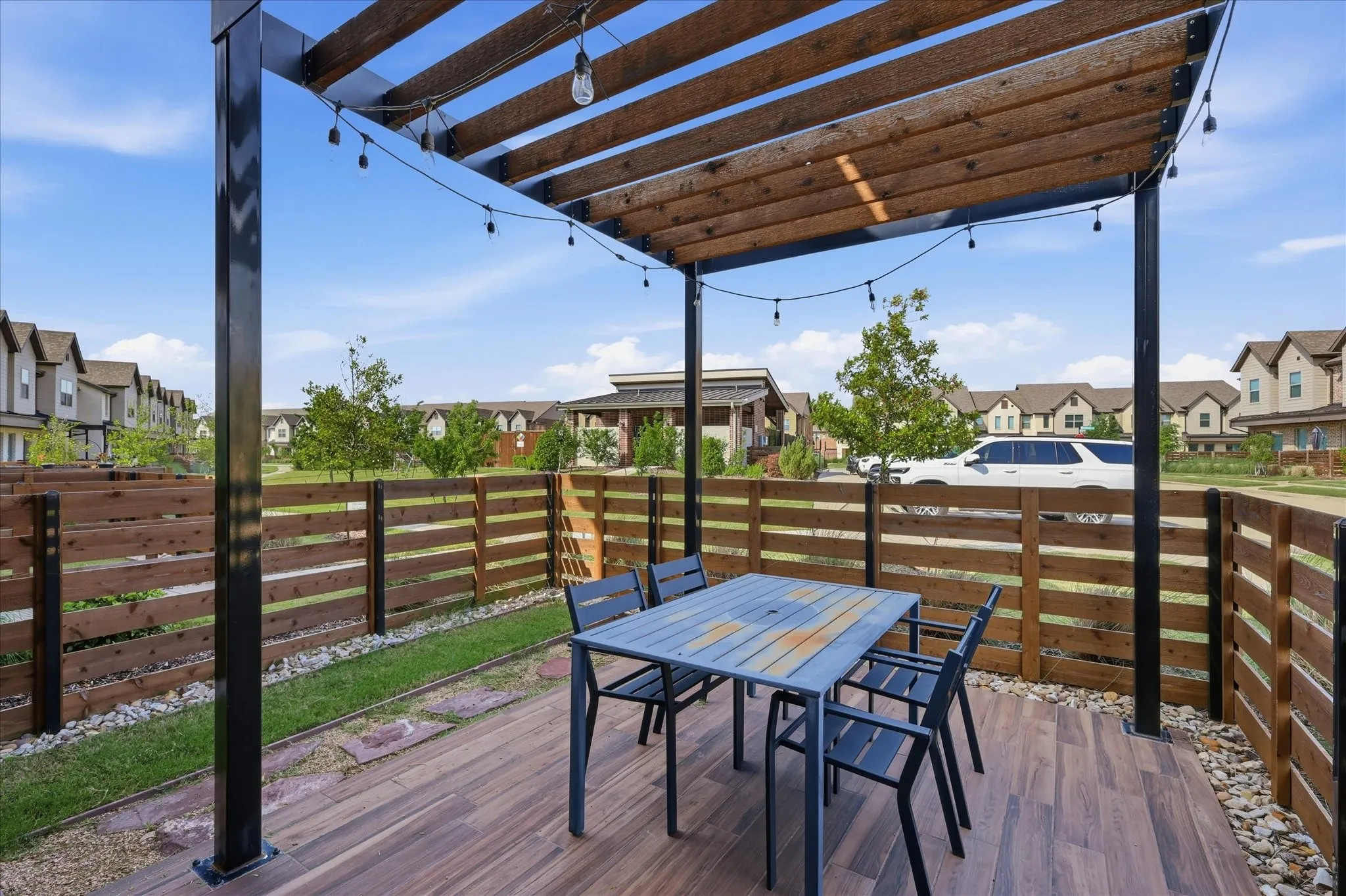 Extended Covered Patio Overlooks the Community Pool
