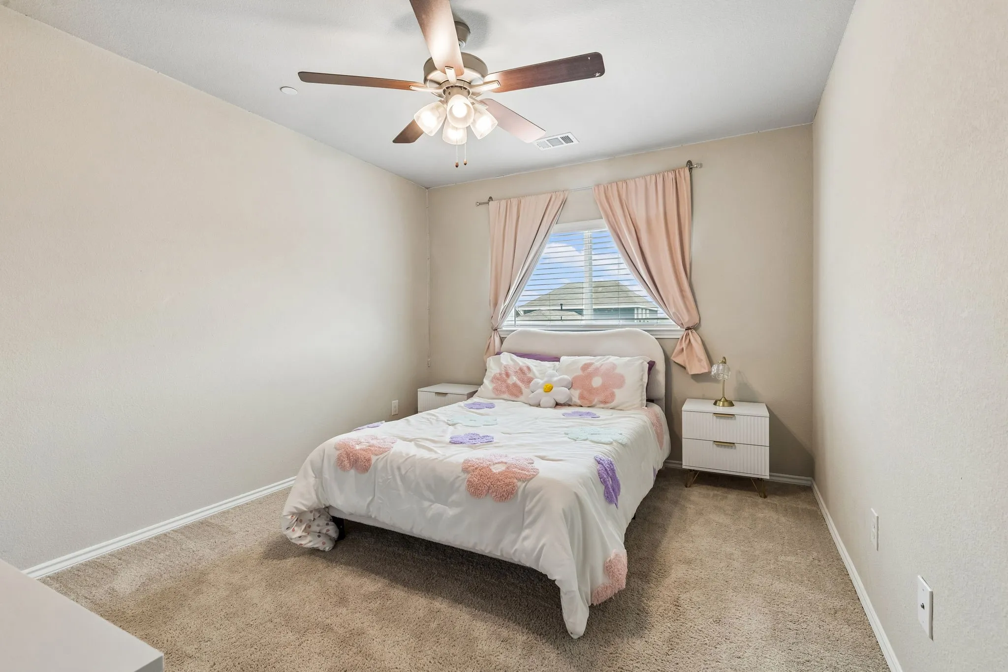 secondary bedroom with large walk in closet