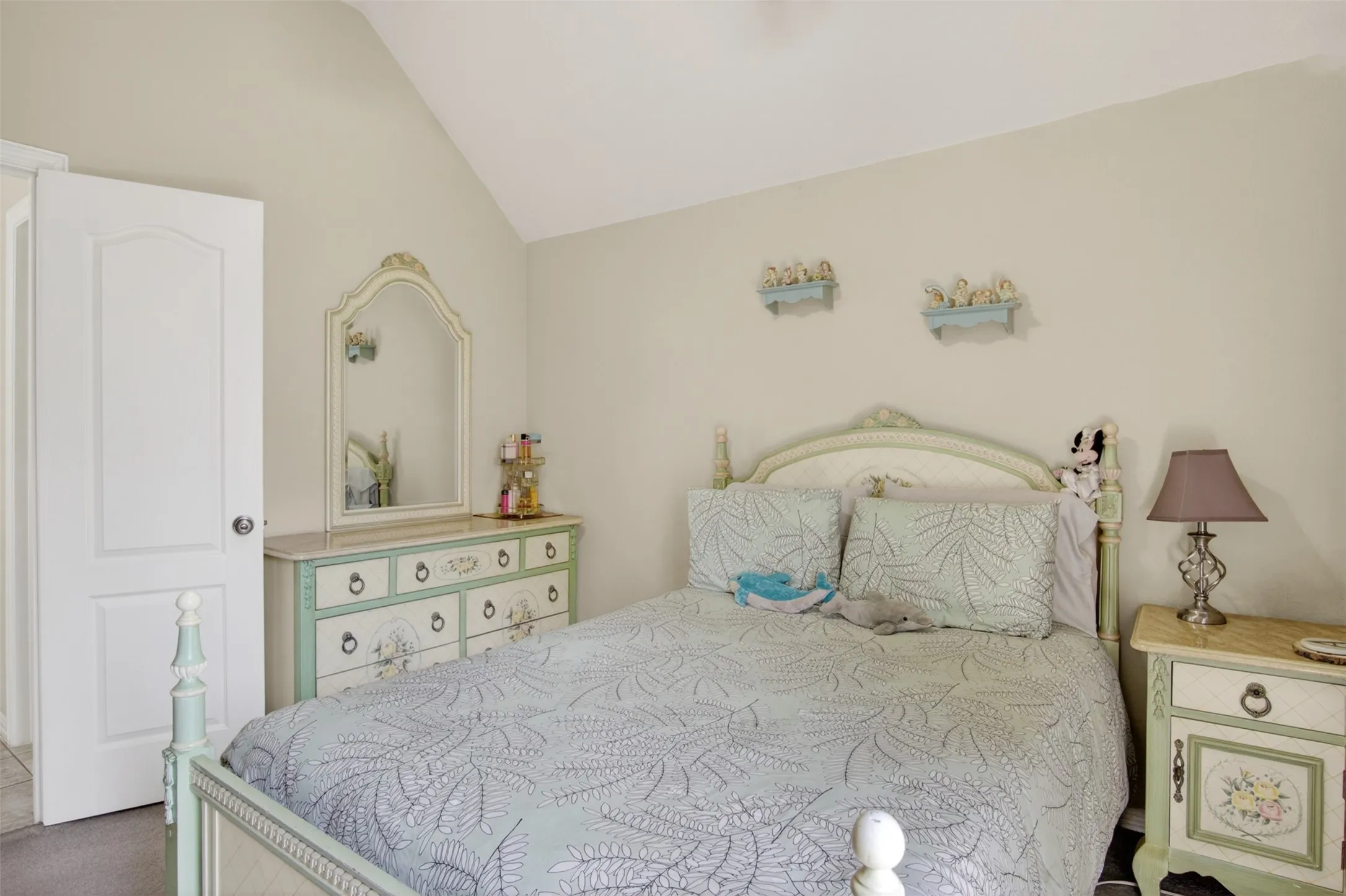 Vaulted ceiling offering architectural interest