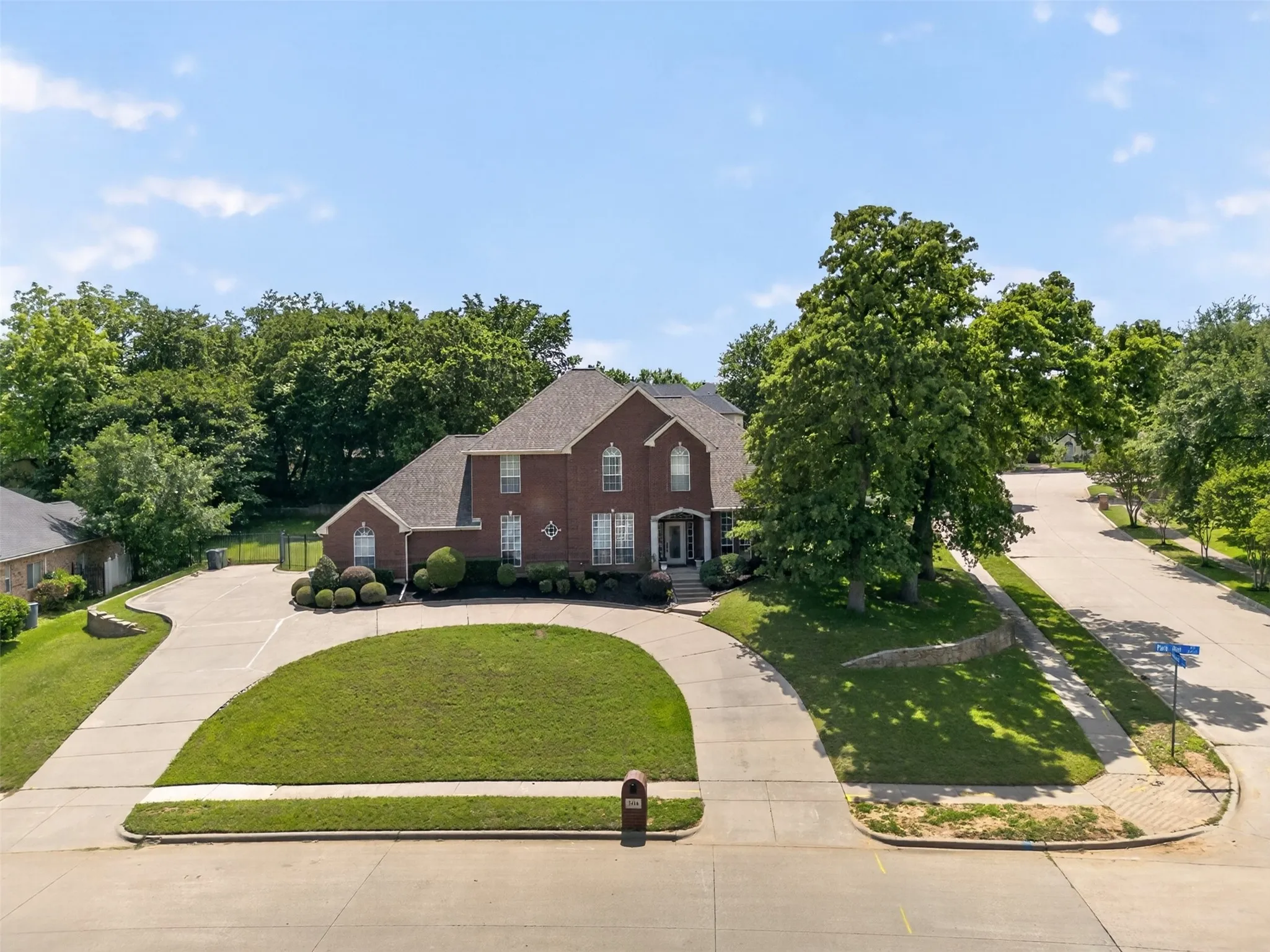 Traditional brick residence with a prominent gabled roofline