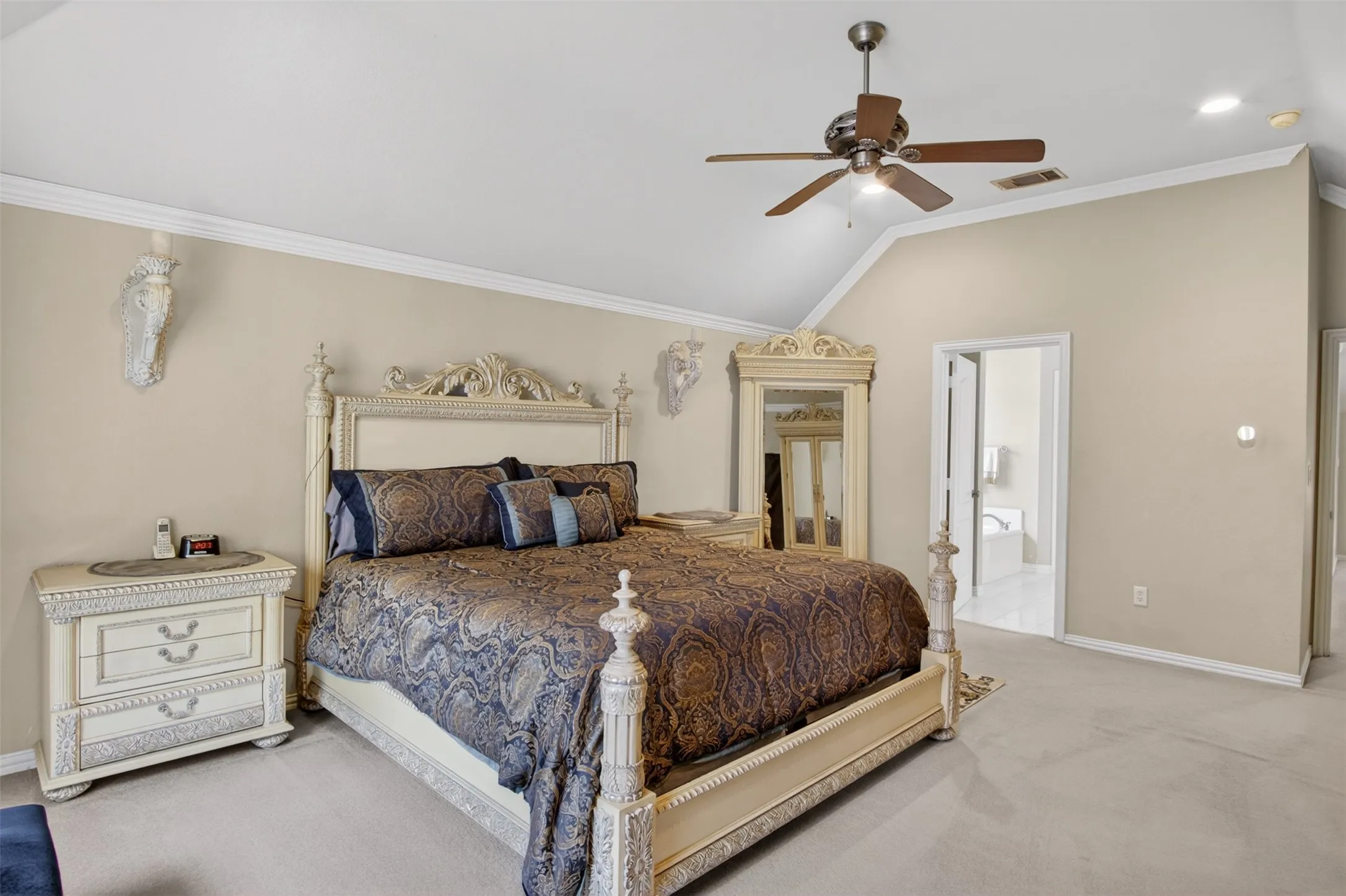 Vaulted ceilings complement the room's spacious layout