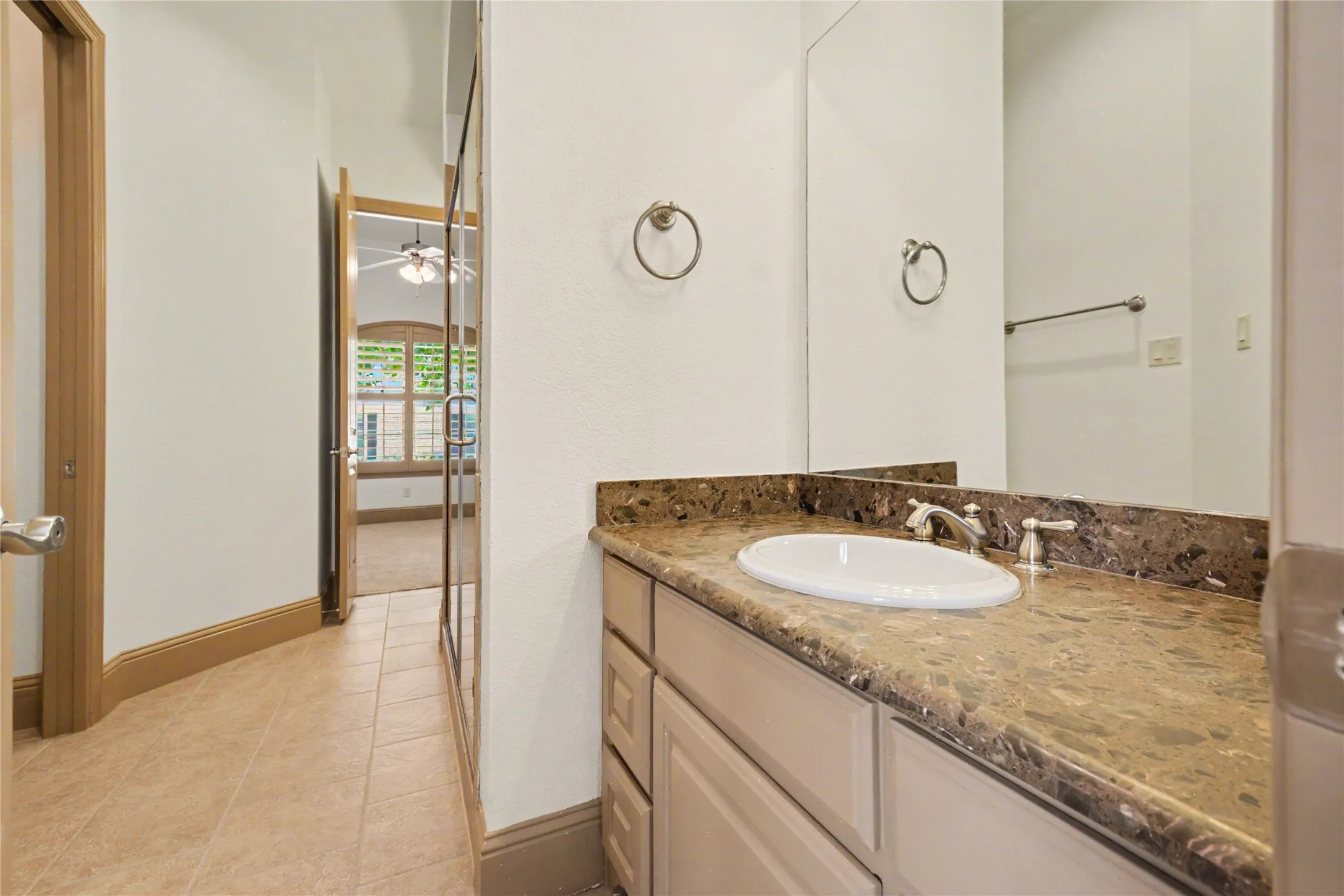 The dual bath that connects bedrooms 2 and 3.