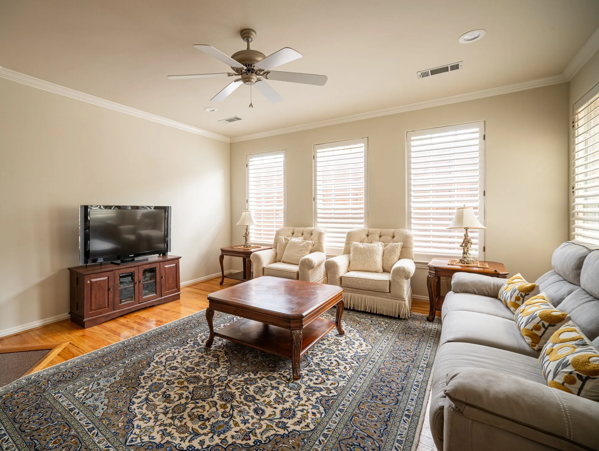 Family Room with Fireplace and ample natural lights (Level 1)