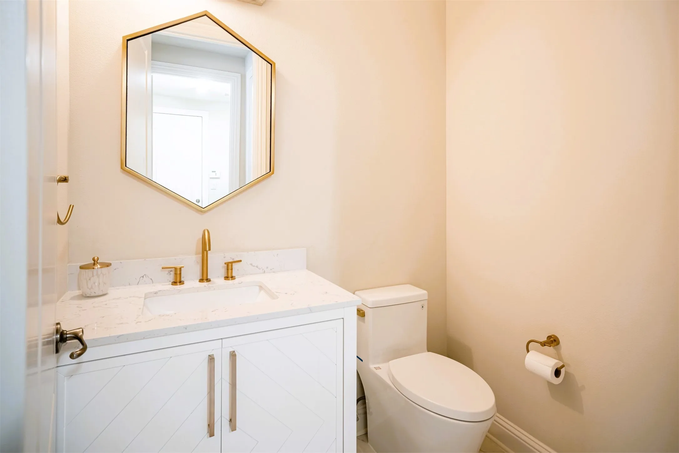 Half Bath (Level 1) next to Family Room