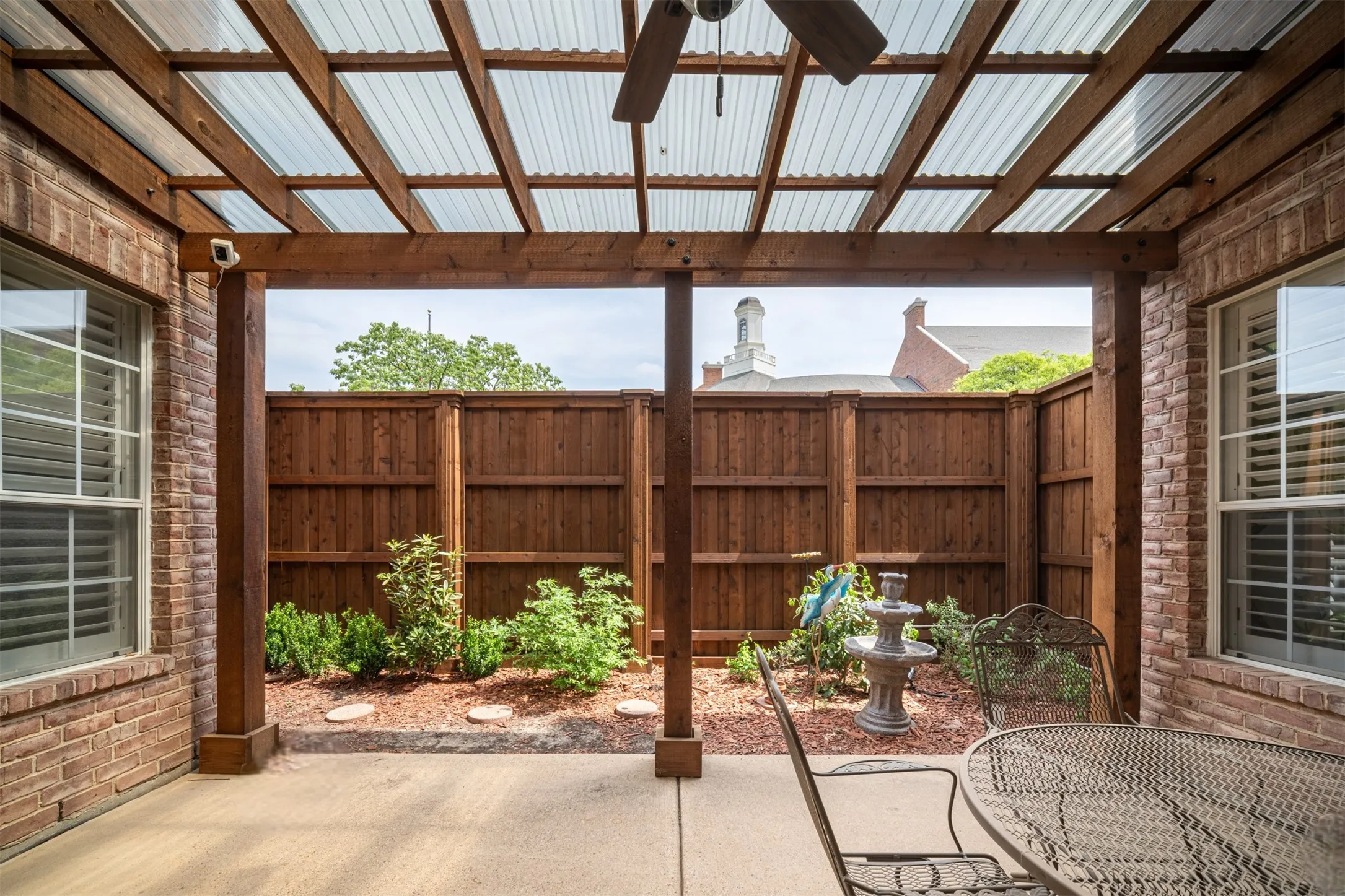 Covered Back Patio with 8' BOB Privacy Cedar Fence and refreshed back scapes