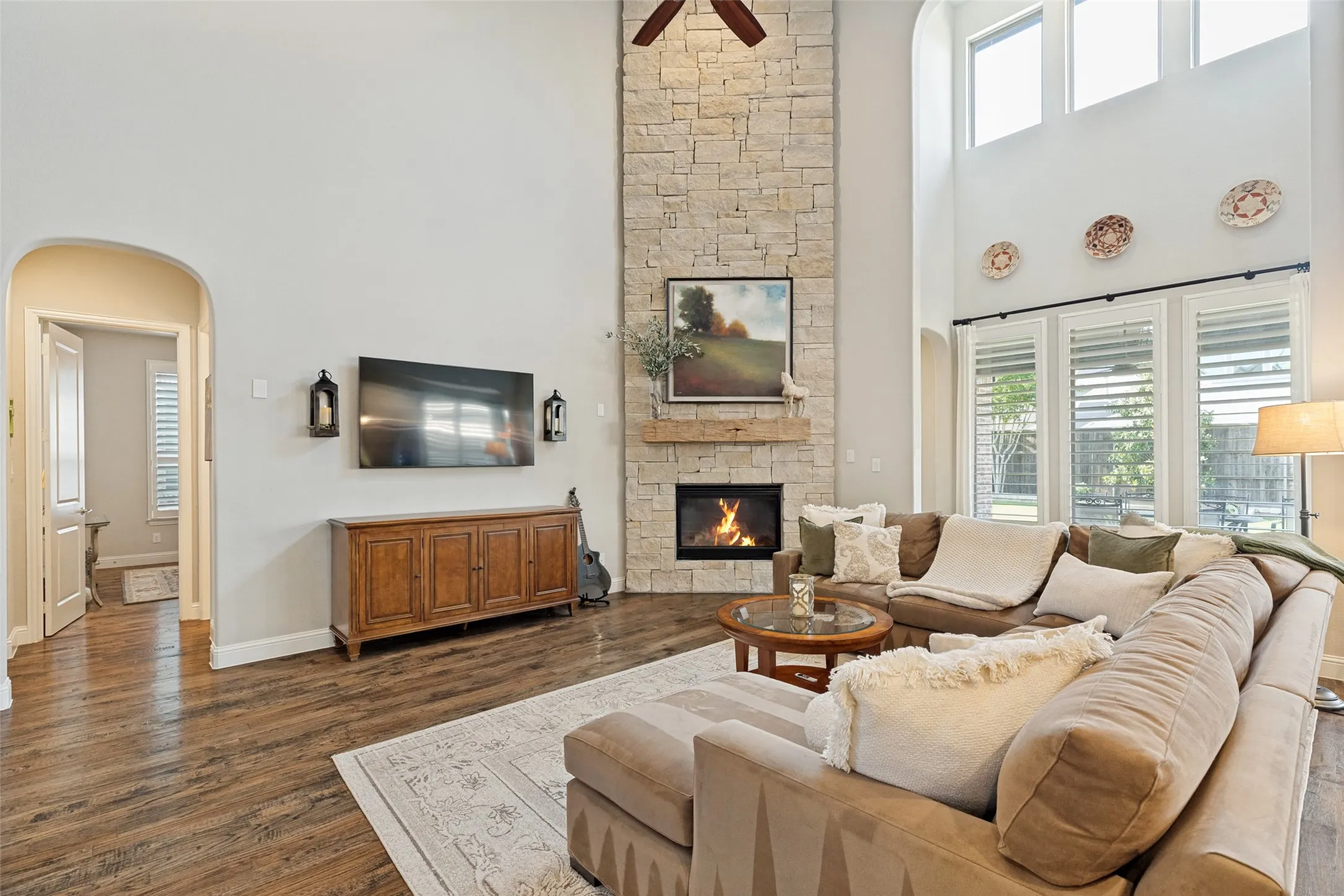 Dramatic Floor to Ceiling Stone Fireplace.