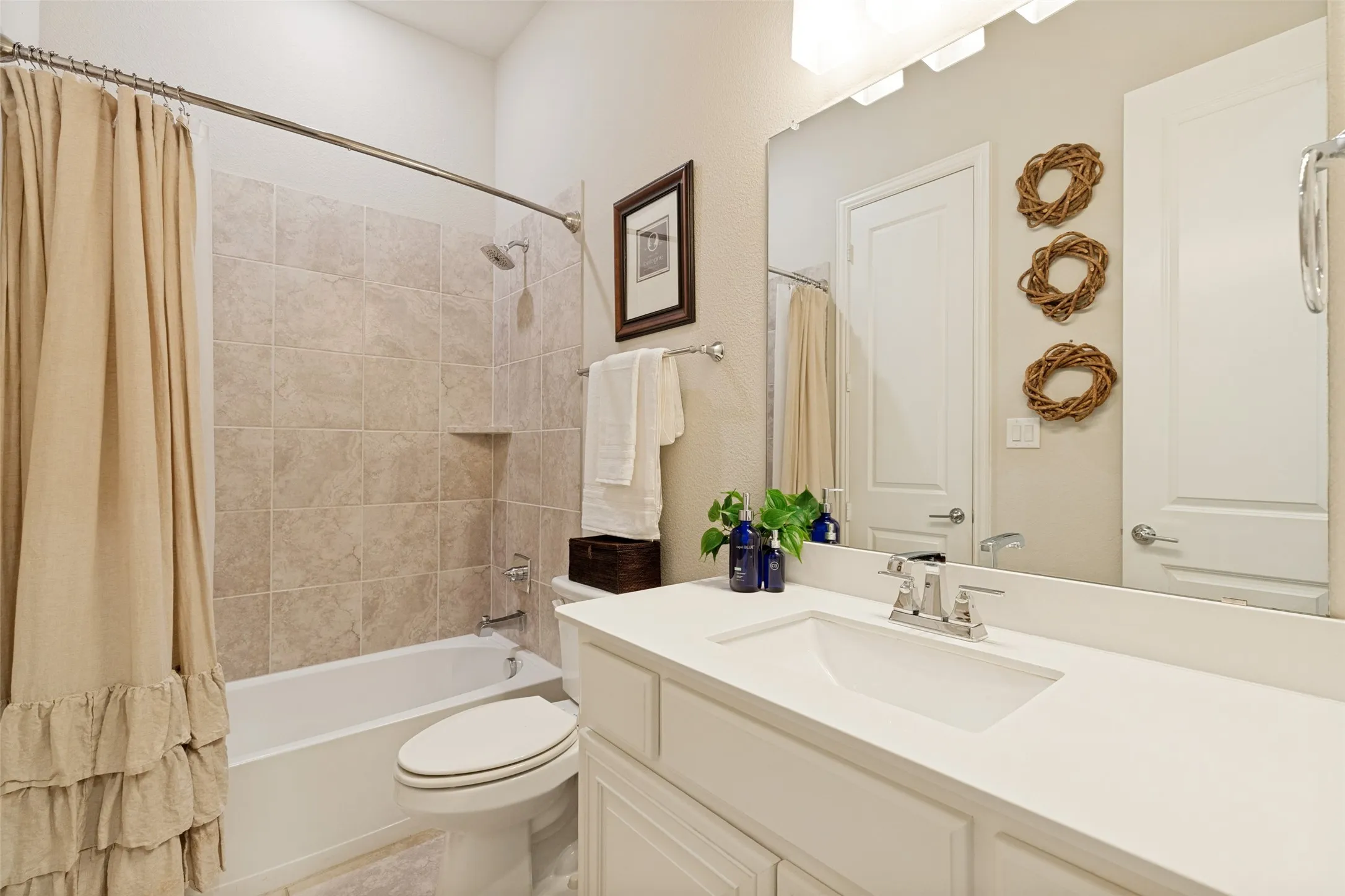 Bathroom on Level 1 connecting to main hall and Guest Room
