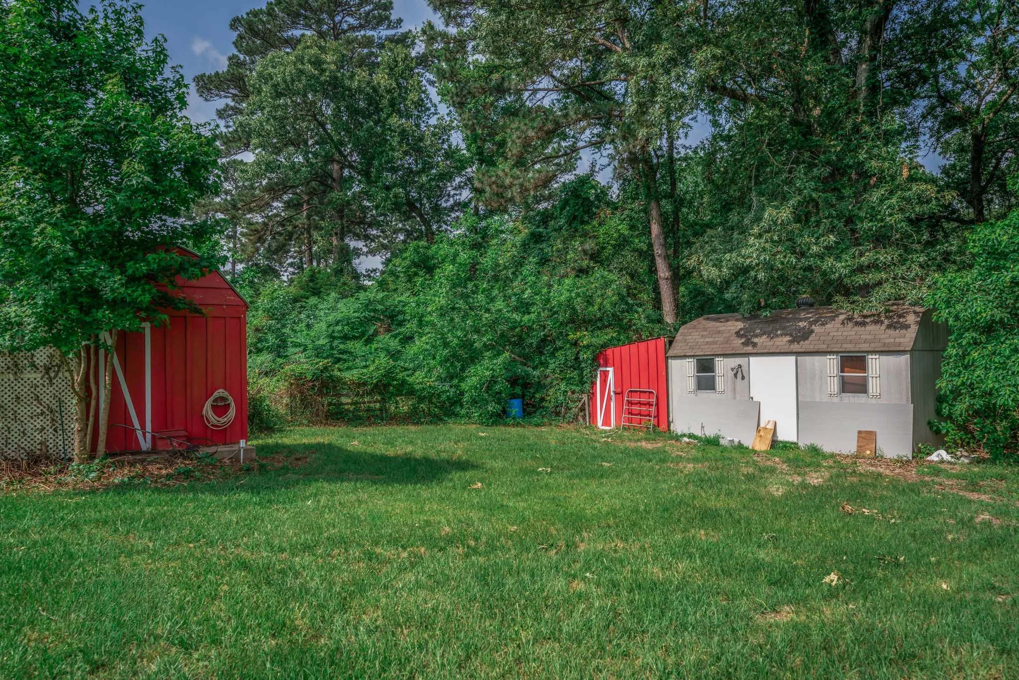 water well with building, storage building, and chicken coop