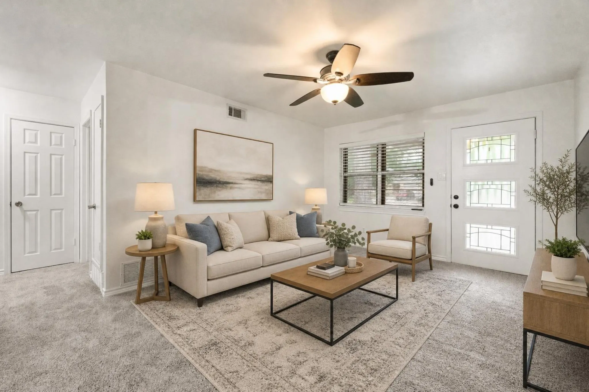Virtually Staged - Whether you're curling up with a book or hosting friends, this front living space offers a delightful setting to create cherished memories. Experience the perfect blend of comfort and functionality in this charming area.