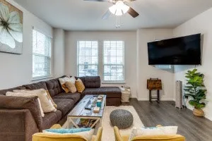 Living space featuring wood-finish flooring and light-toned walls