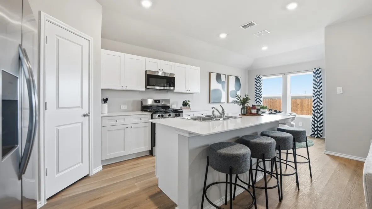 Kitchen- All Home and community information, including pricing, included features, terms, availability and amenities, are subject to change at any time without notice or obligation. All Drawings, pictures, photographs, video, square footages, floor plans, elevations, features, colors and sizes are approximate for illustration purposes only and will vary from the homes as built.