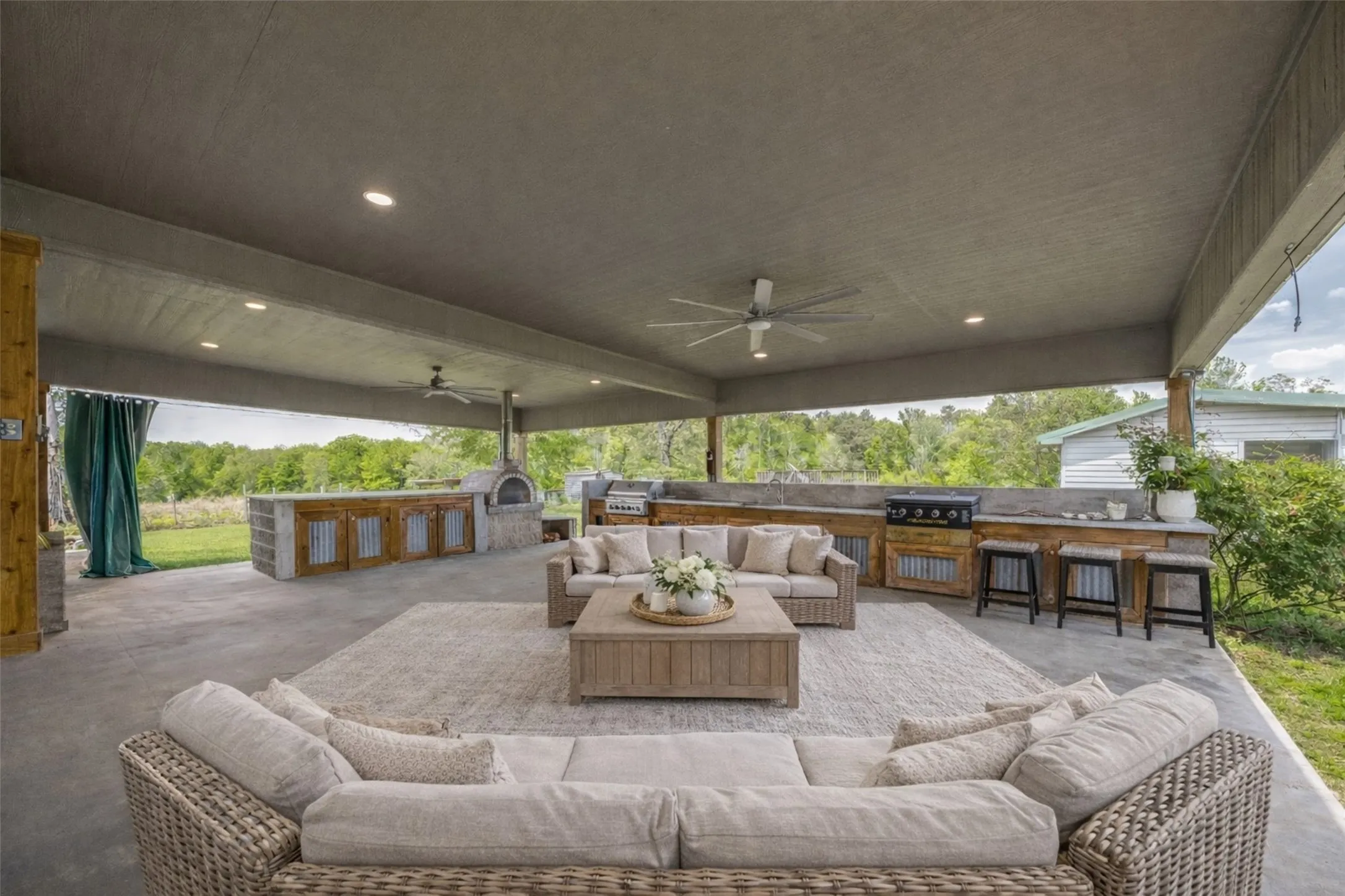 Covered back porch with outdoor kitchen.  Approx 36x20.