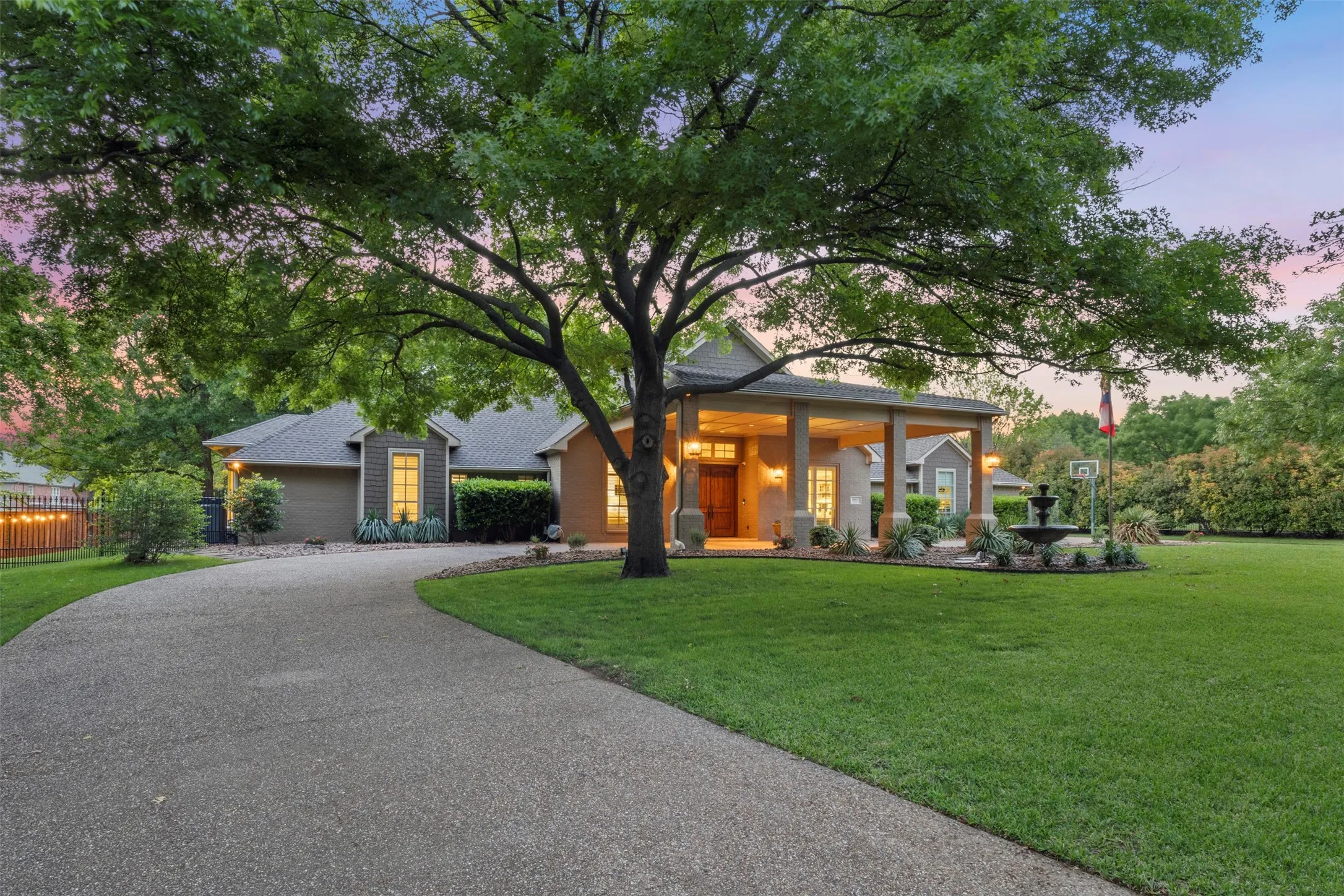 expansive porte cochere and circular driveway