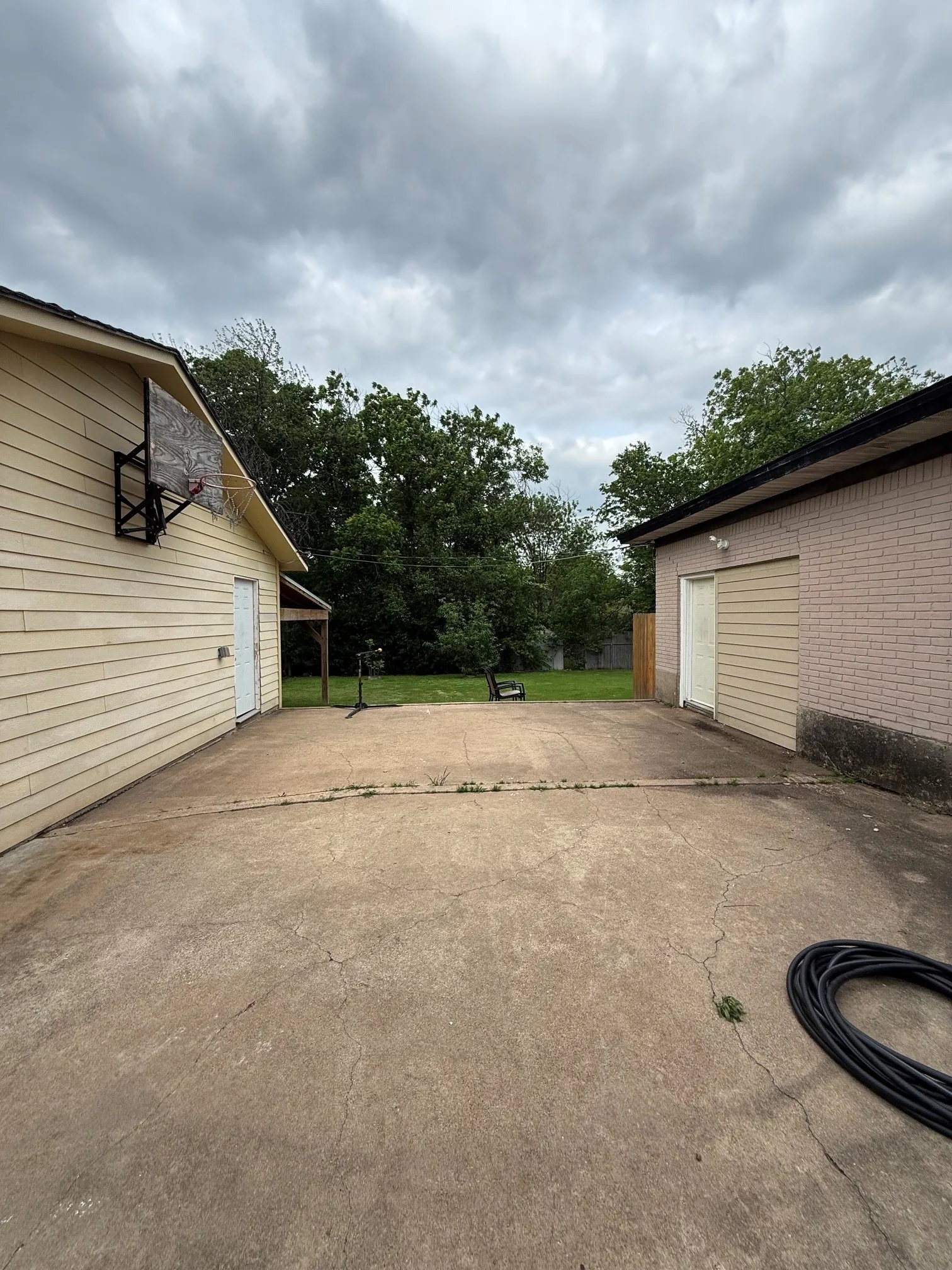 Patio area between home and garage