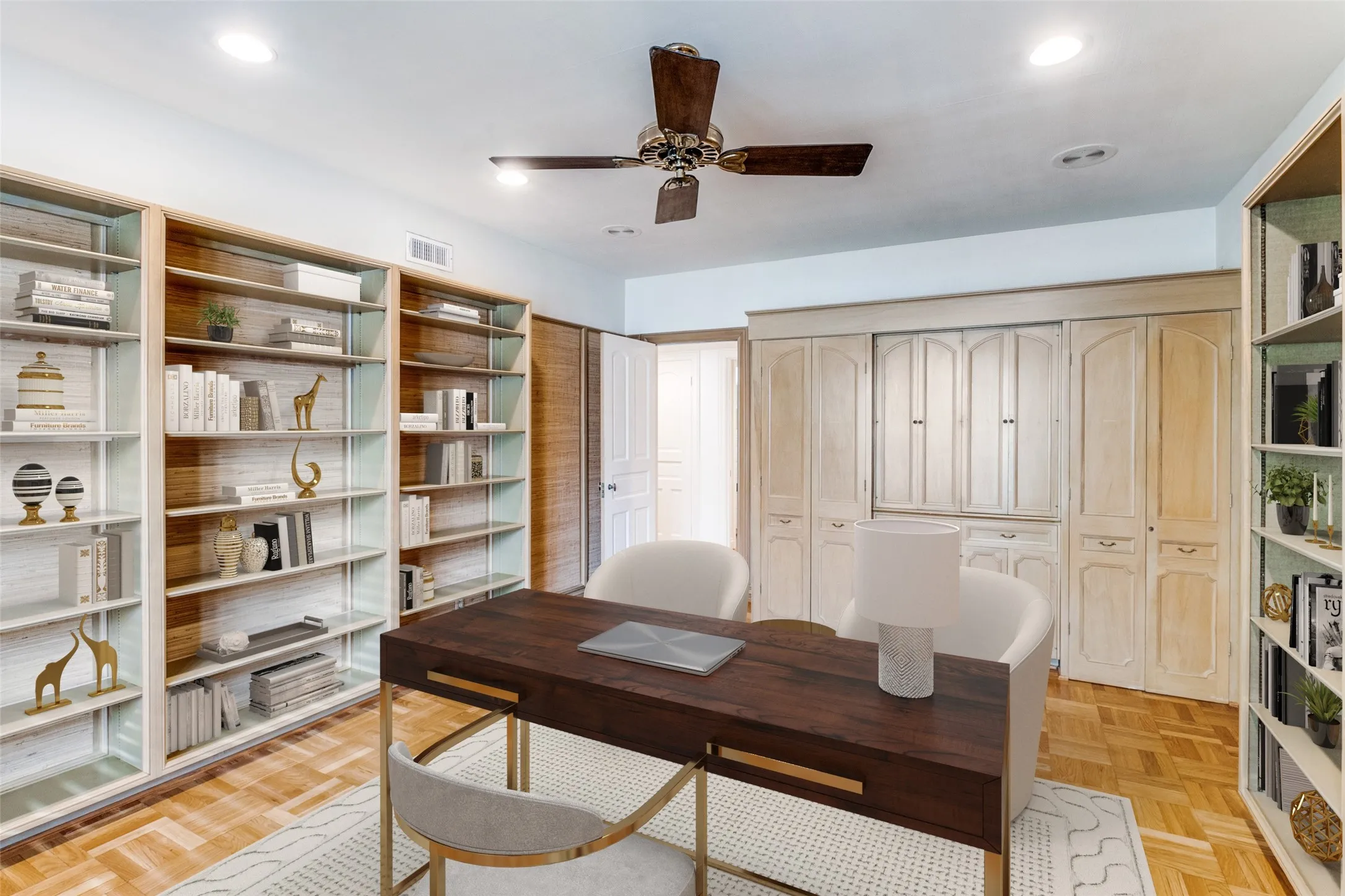Large study with an abundance of built ins and a wet bar.