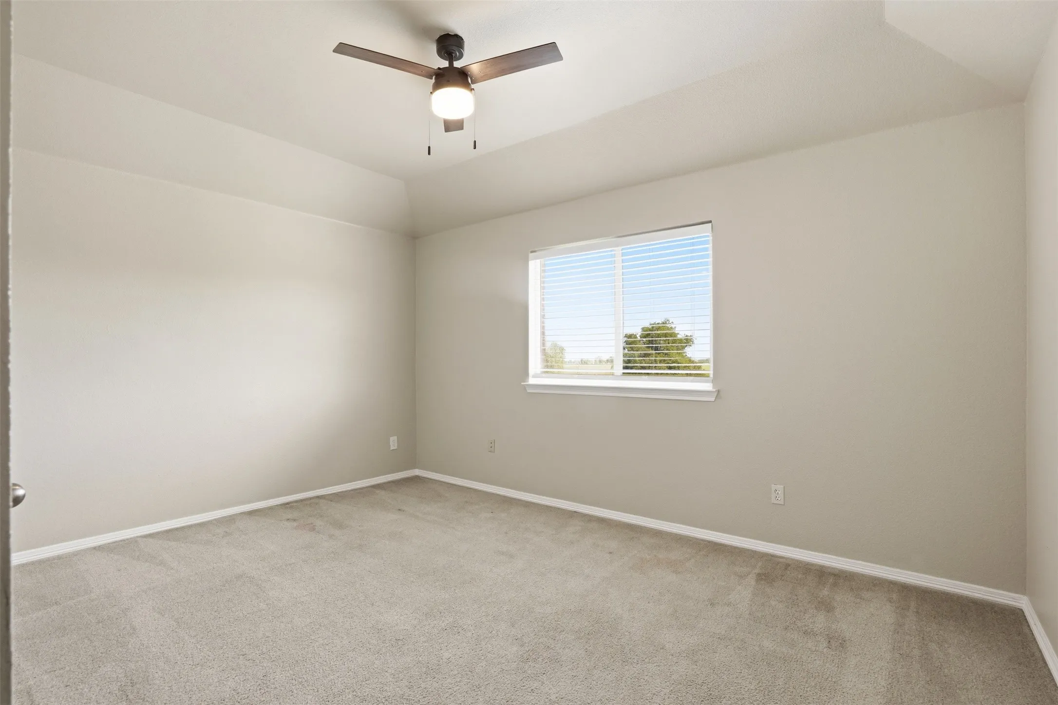 Bedroom #4 with fresh paint and plenty of natural light.