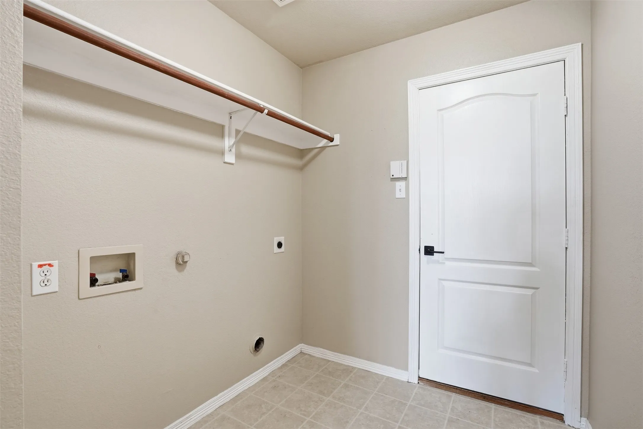 Laundry room with W/D connections.
