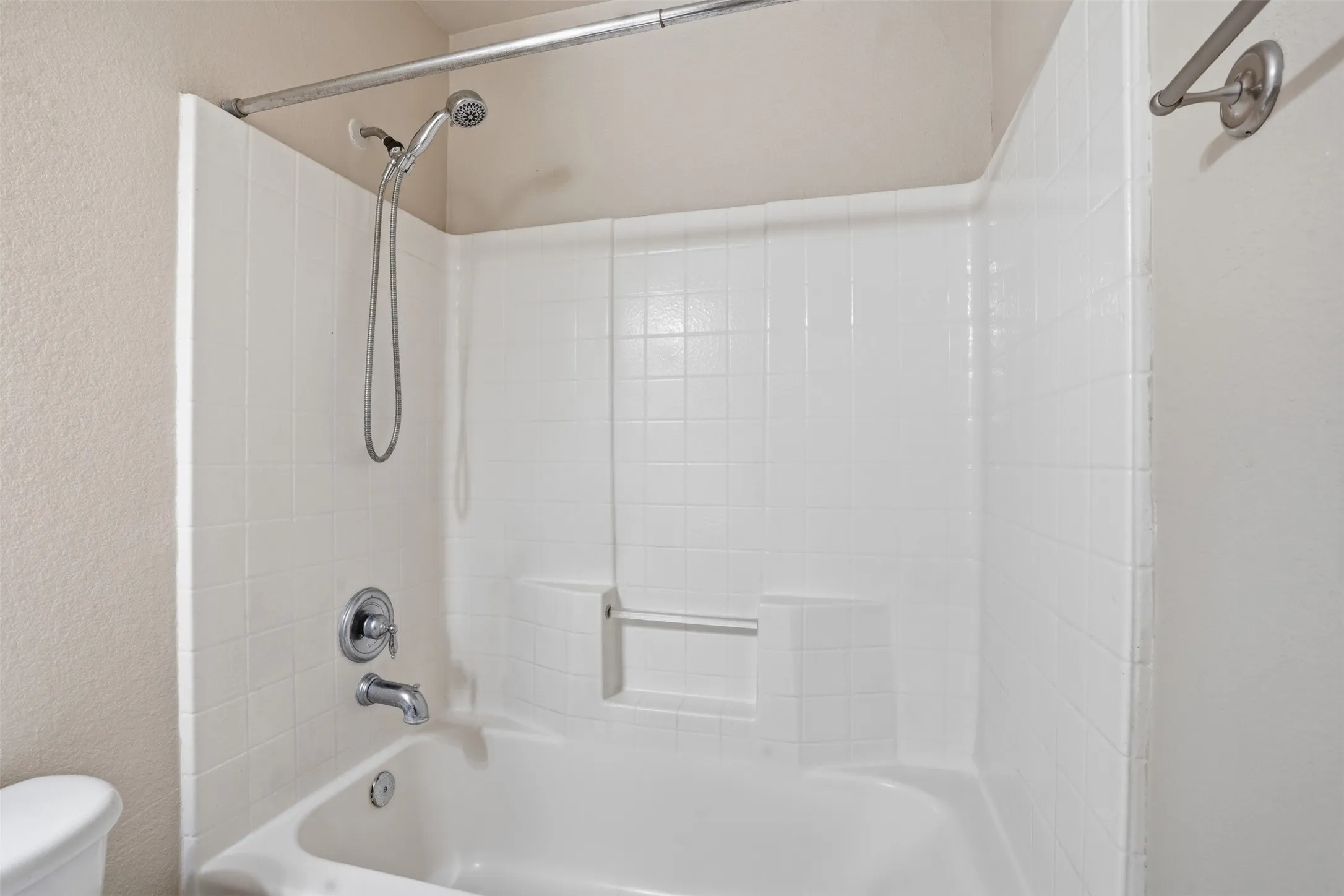 Bathroom with tub/shower combination.