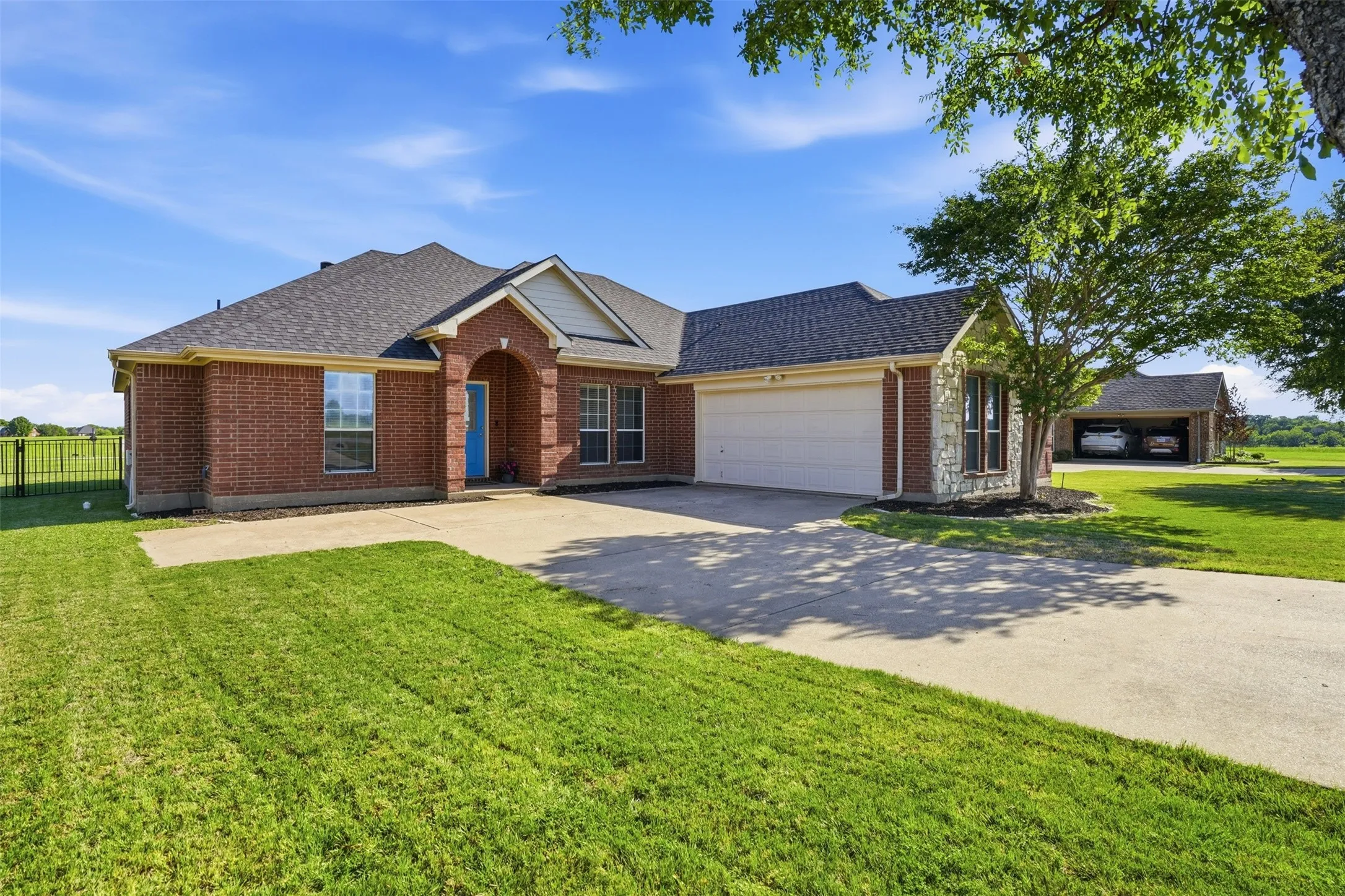 4 bedroom, 2 bath brick and stone home in the gated community of The Retreat.