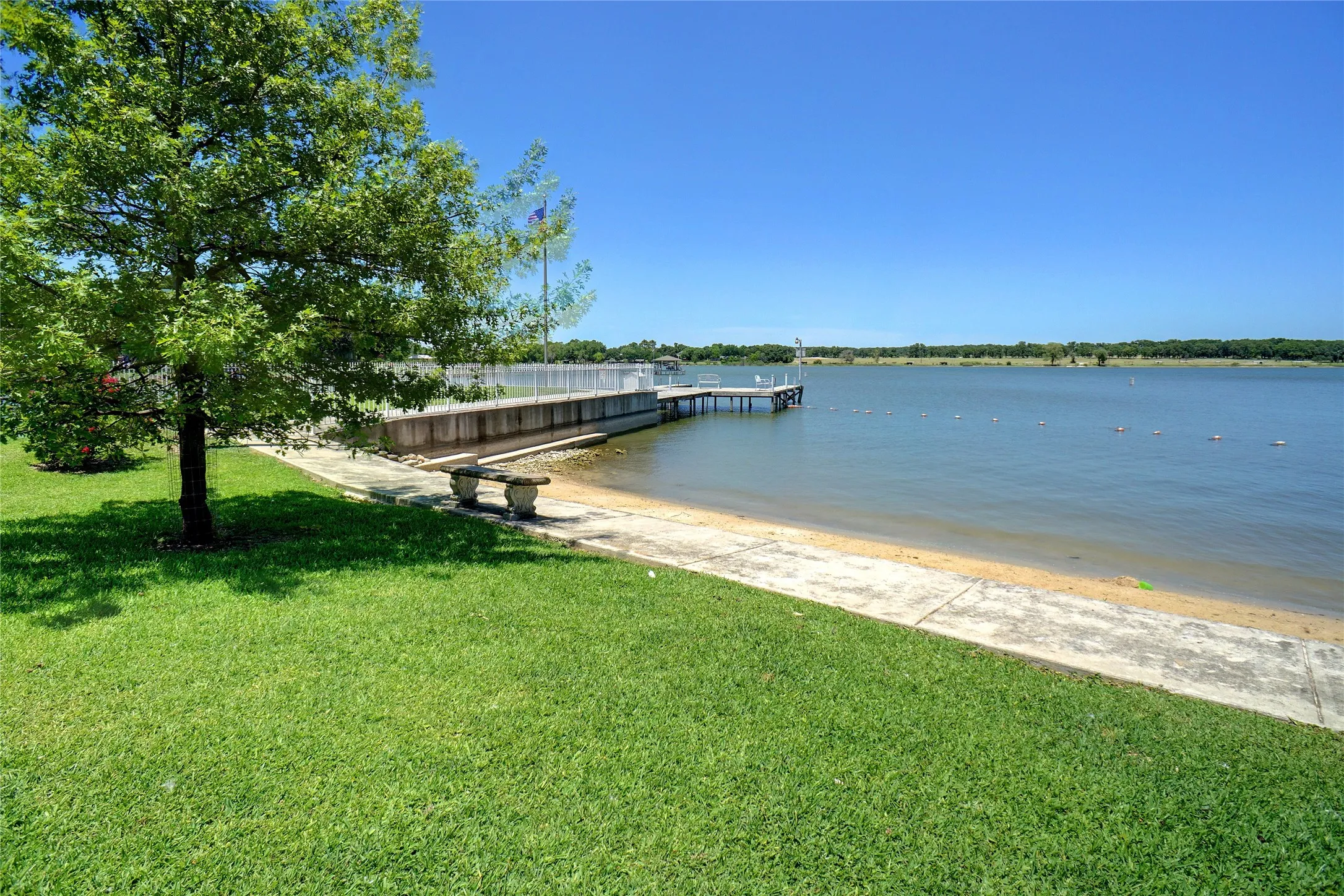 Beachfront with view of fishing​​‌​​​​‌​​‌‌​‌‌​​​‌‌​‌​‌​‌​​​‌​​ pier.