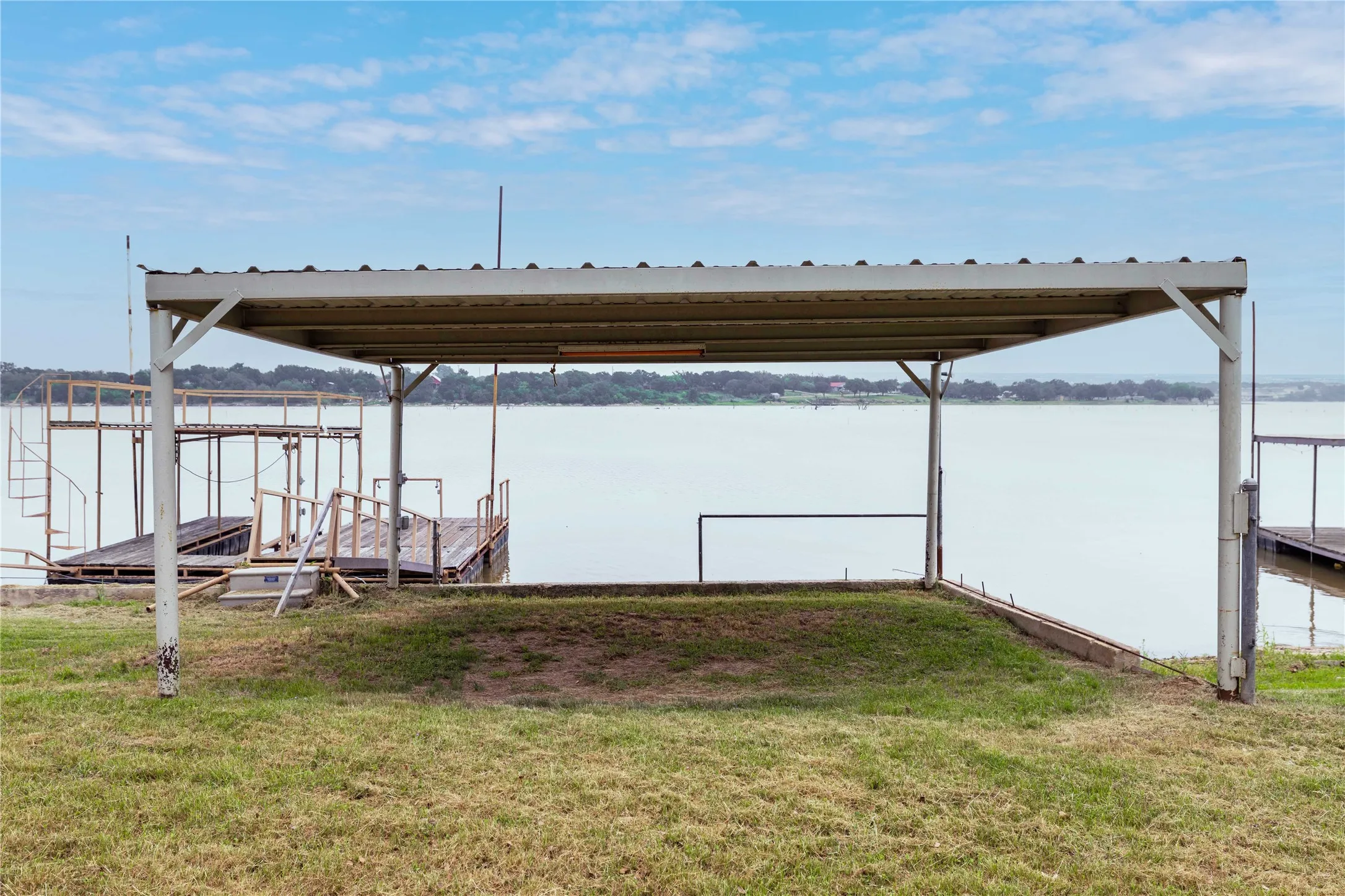 Covered patio offers a great place to catch some shade while enjoying lake life.