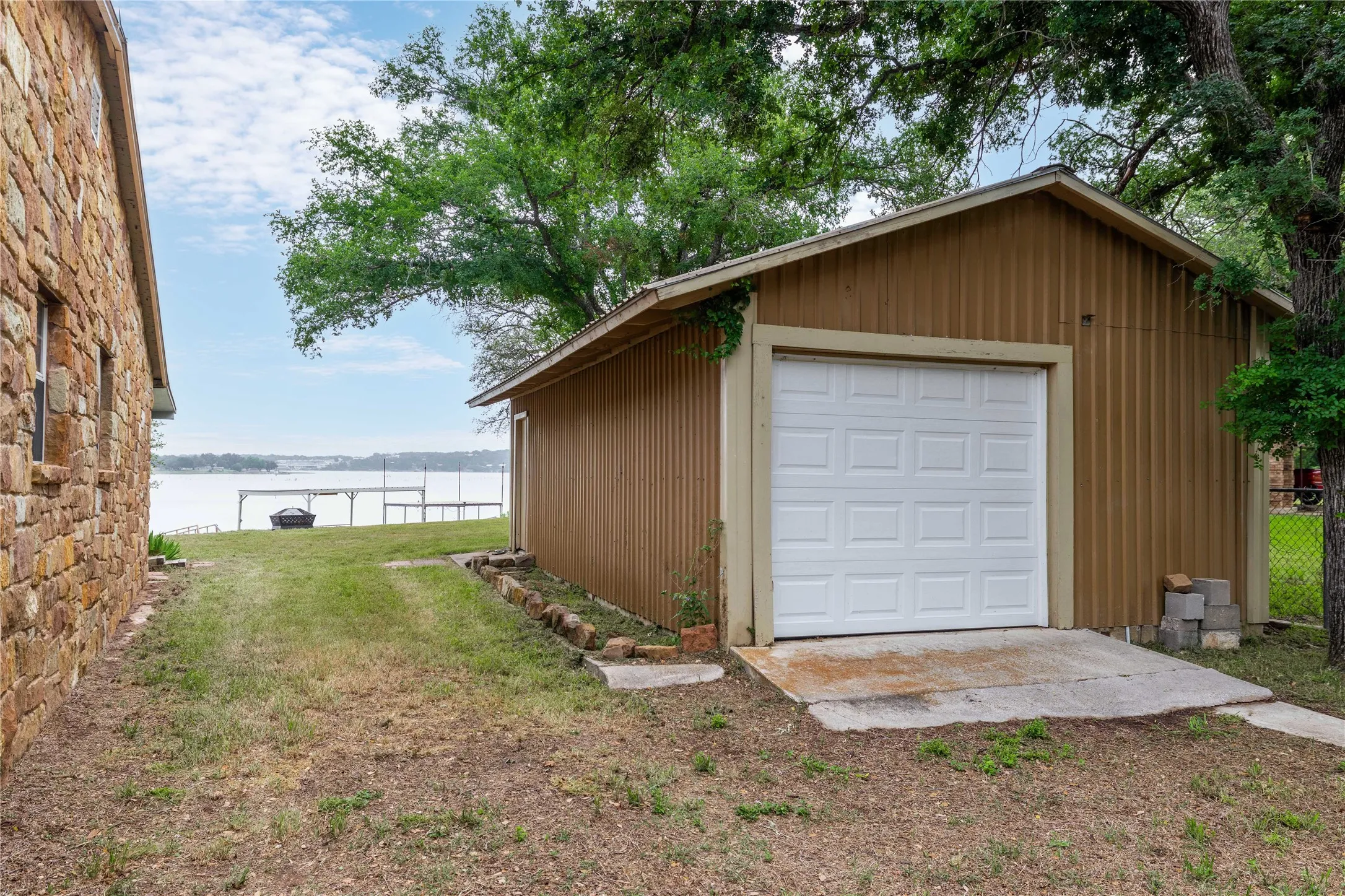 1-car garage with storage at the back of the garage.