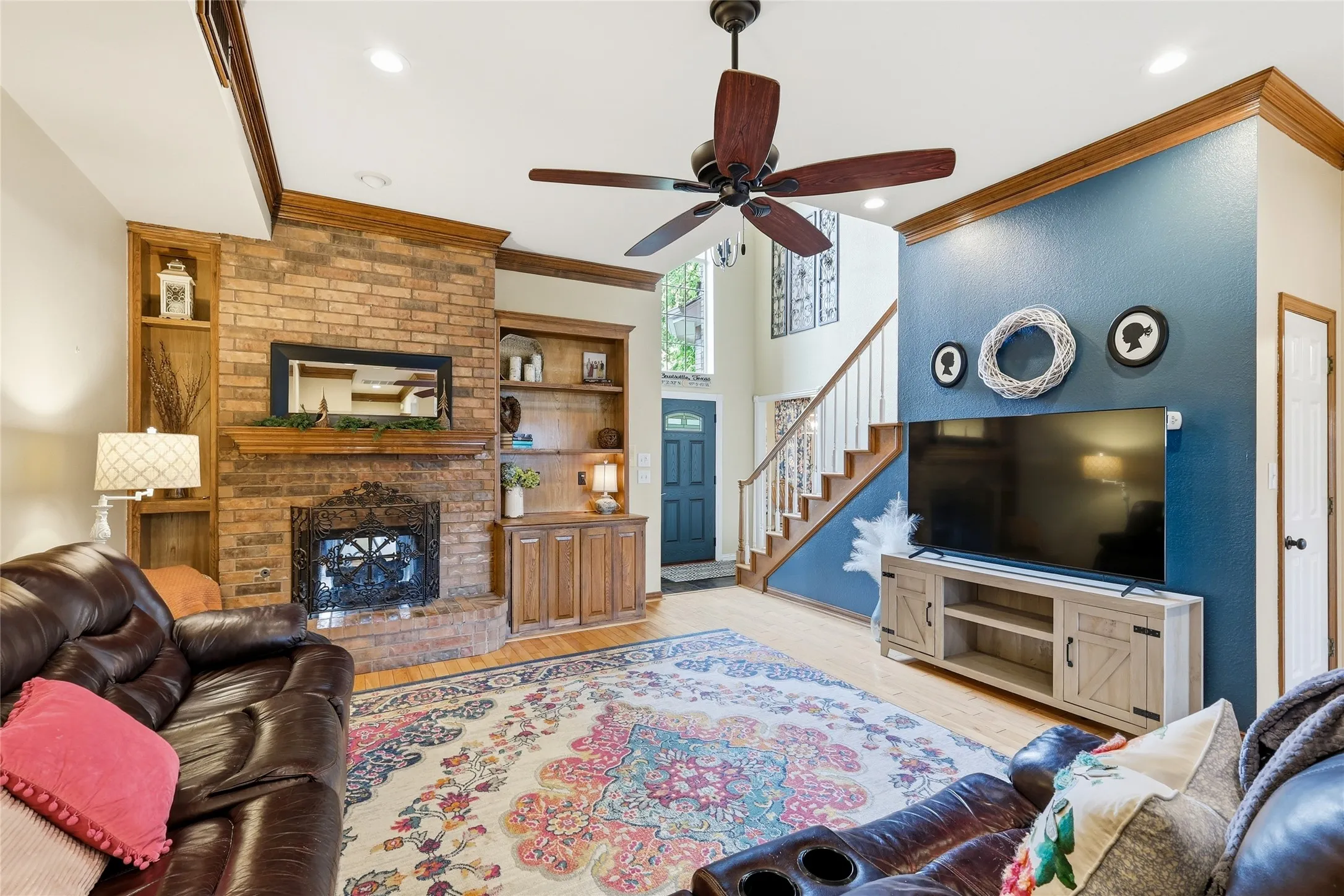 The living room is massive and has a double fireplace.