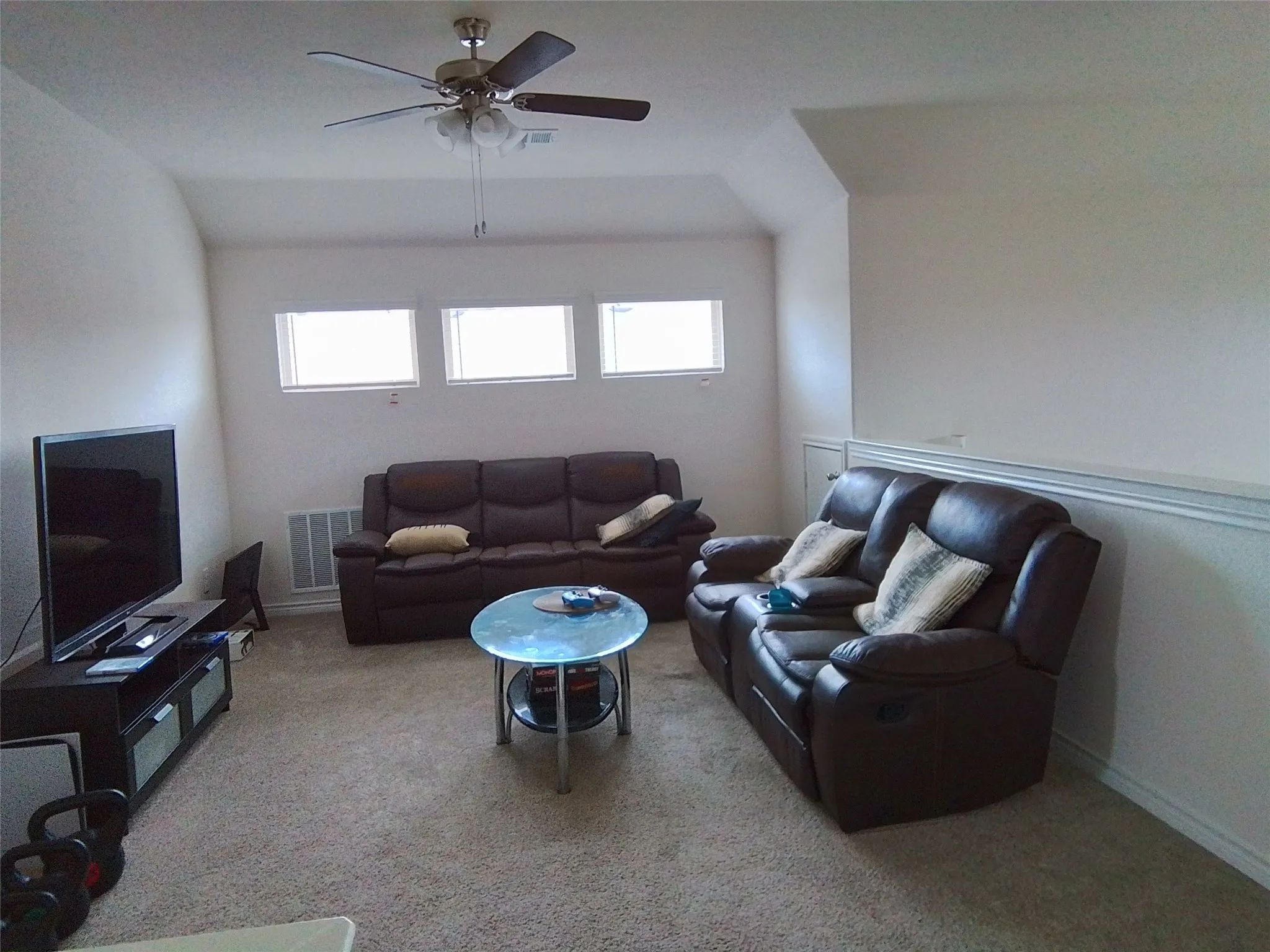 Upstairs Living area. Couches and table can stay.