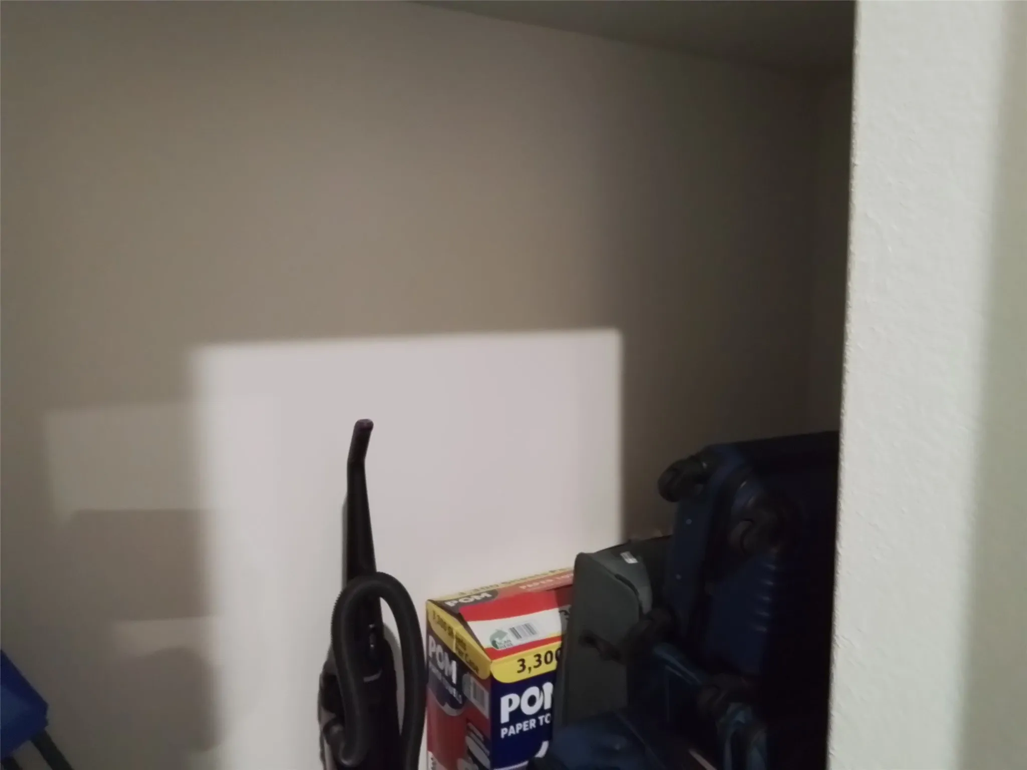 Storage under the stairs.