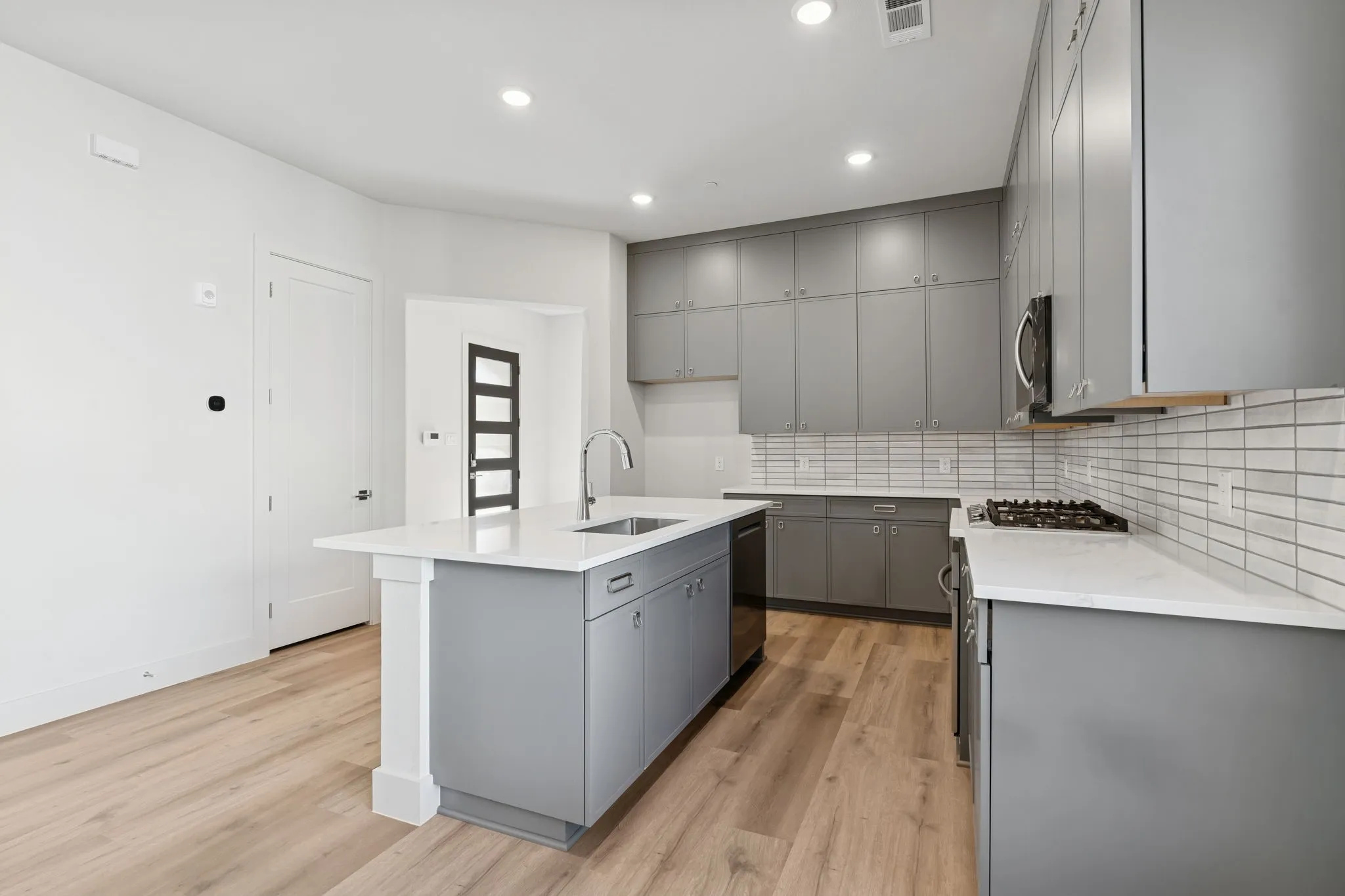 Walk in pantry in kitchen area.