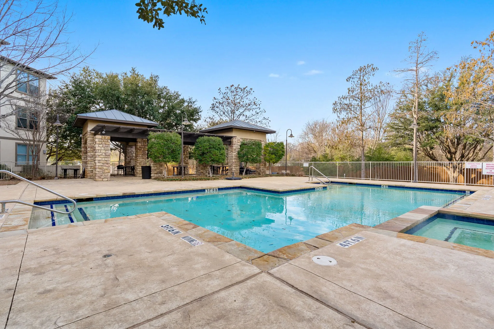 Pool and outdoor grill area.