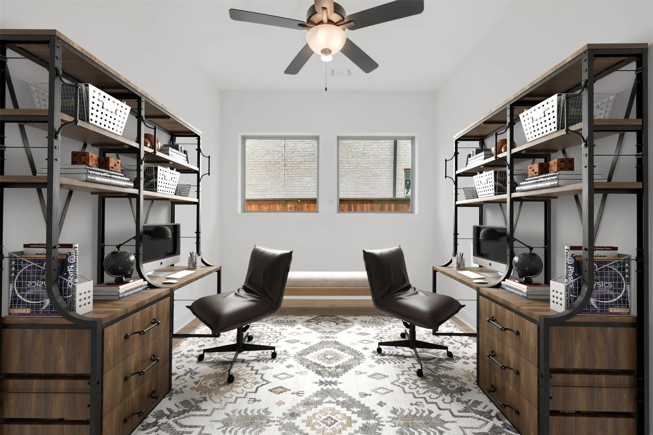 Dual workspace featuring built-in wood-finish desks with lower cabinetry and shelving on each side, complemented by black office chairs