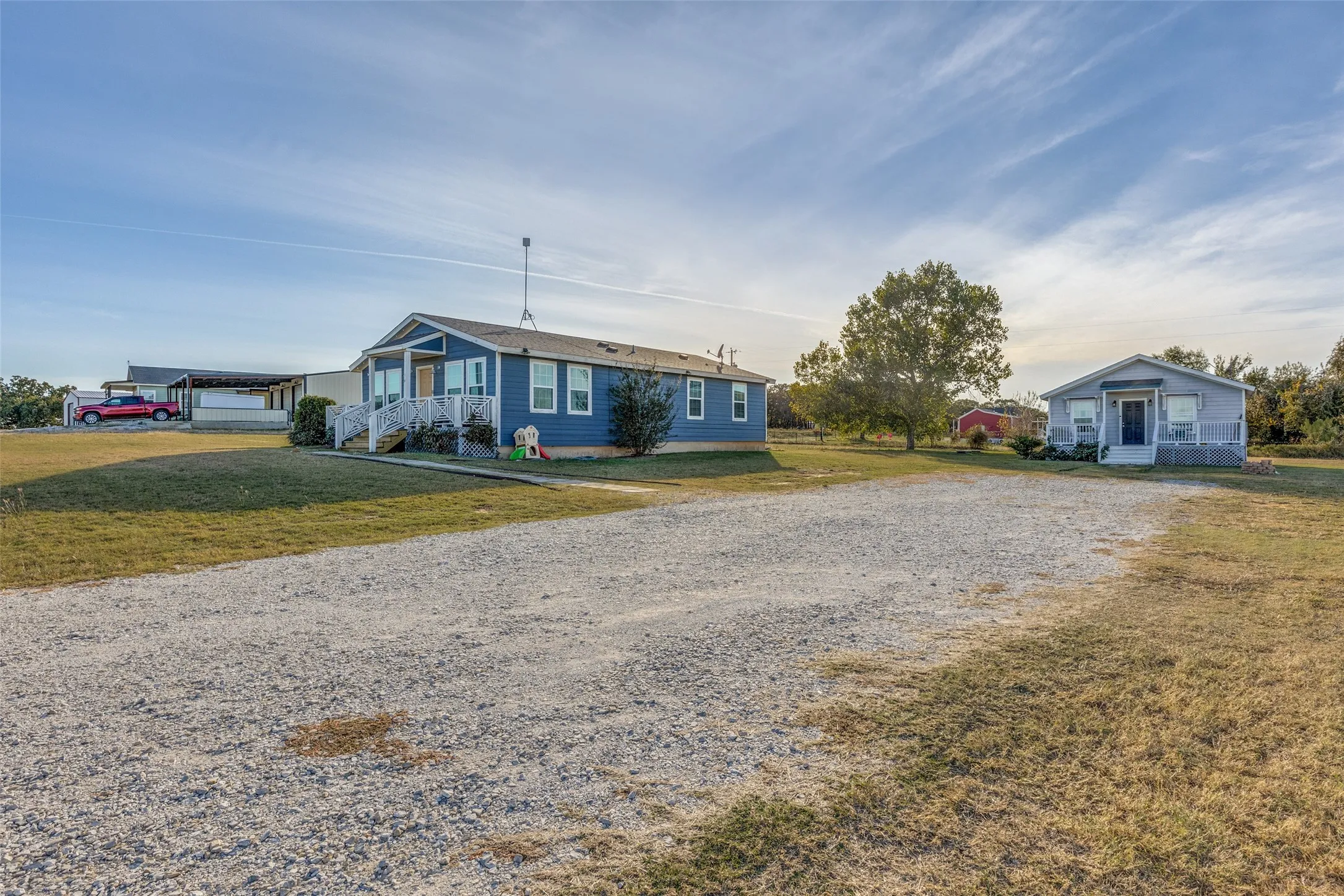This unique property has two homes on over an acre!