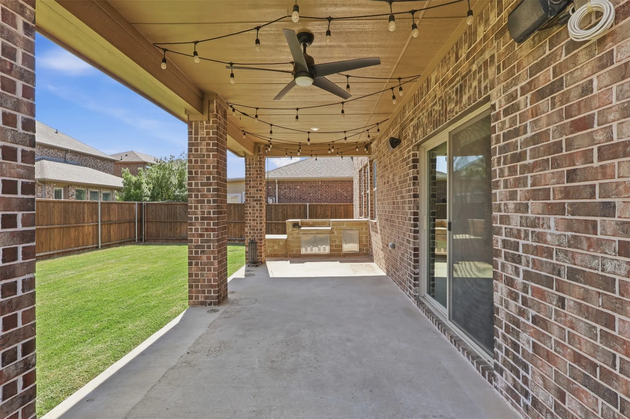 Covered patio with outdoor kitchen