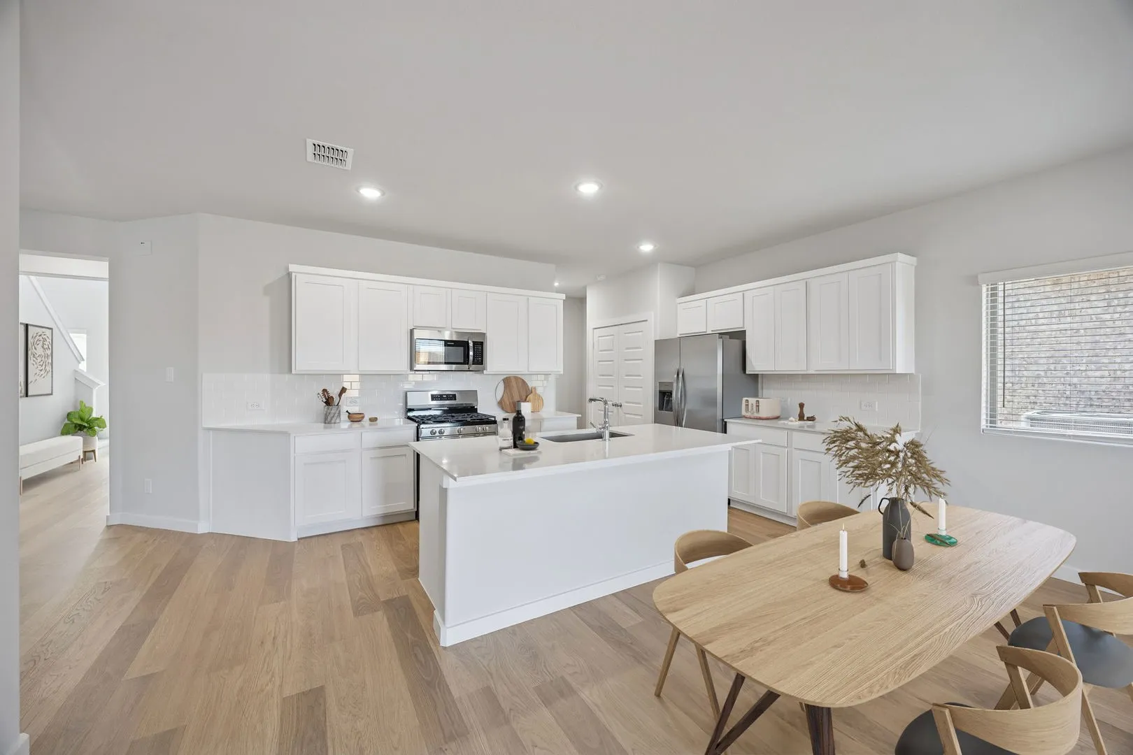 Kitchen in the Oak II home plan by Trophy Signature Homes – REPRESENTATIVE PHOTO