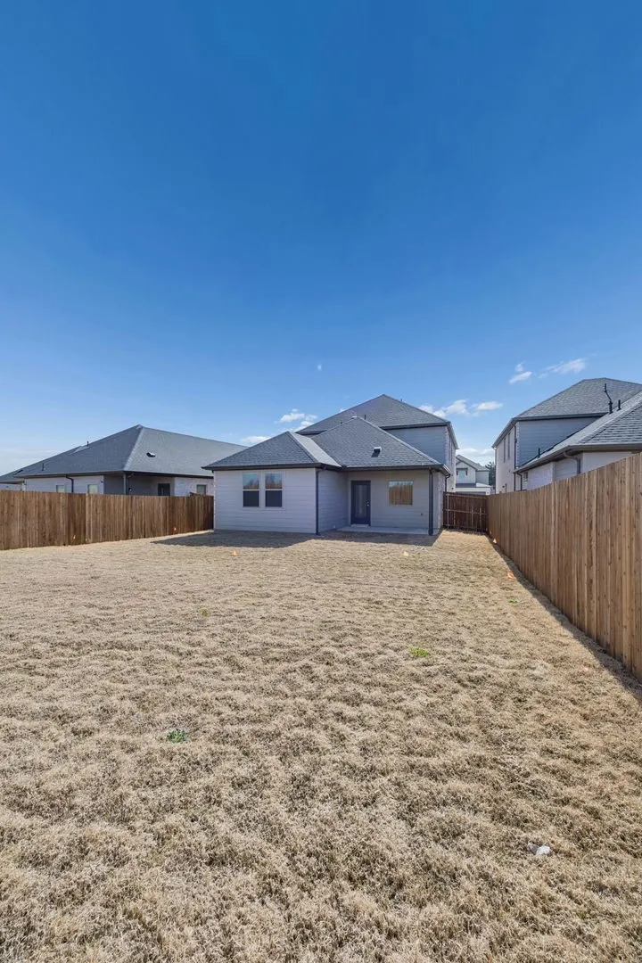 Covered Patio in the Oak II home plan by Trophy Signature Homes – REPRESENTATIVE PHOTO