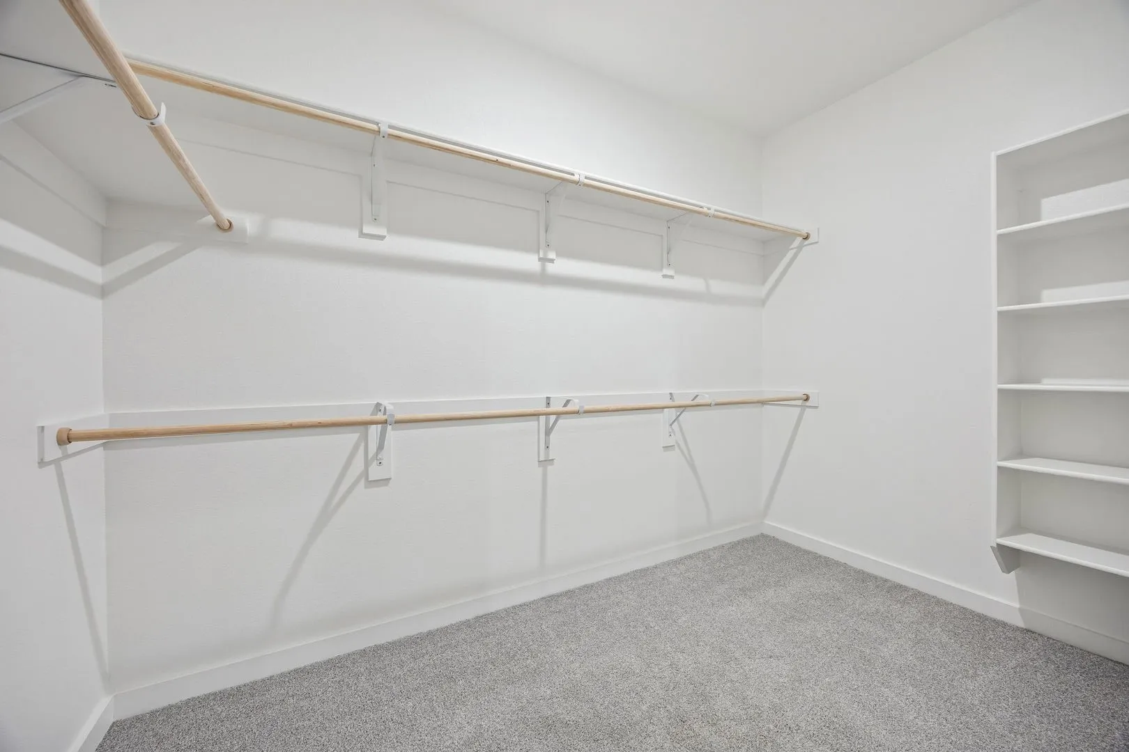 Primary Closet in the Oak II home plan by Trophy Signature Homes – REPRESENTATIVE PHOTO