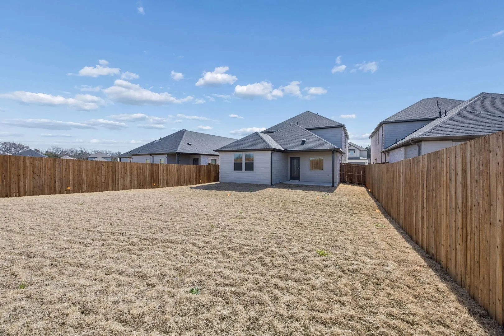 Covered Patio in the Oak II home plan by Trophy Signature Homes – REPRESENTATIVE PHOTO