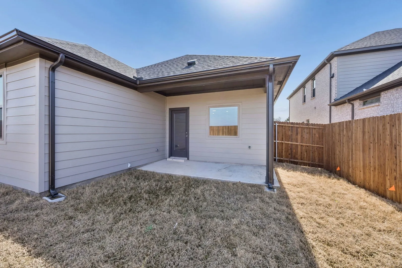 Covered Patio in the Oak II home plan by Trophy Signature Homes – REPRESENTATIVE PHOTO