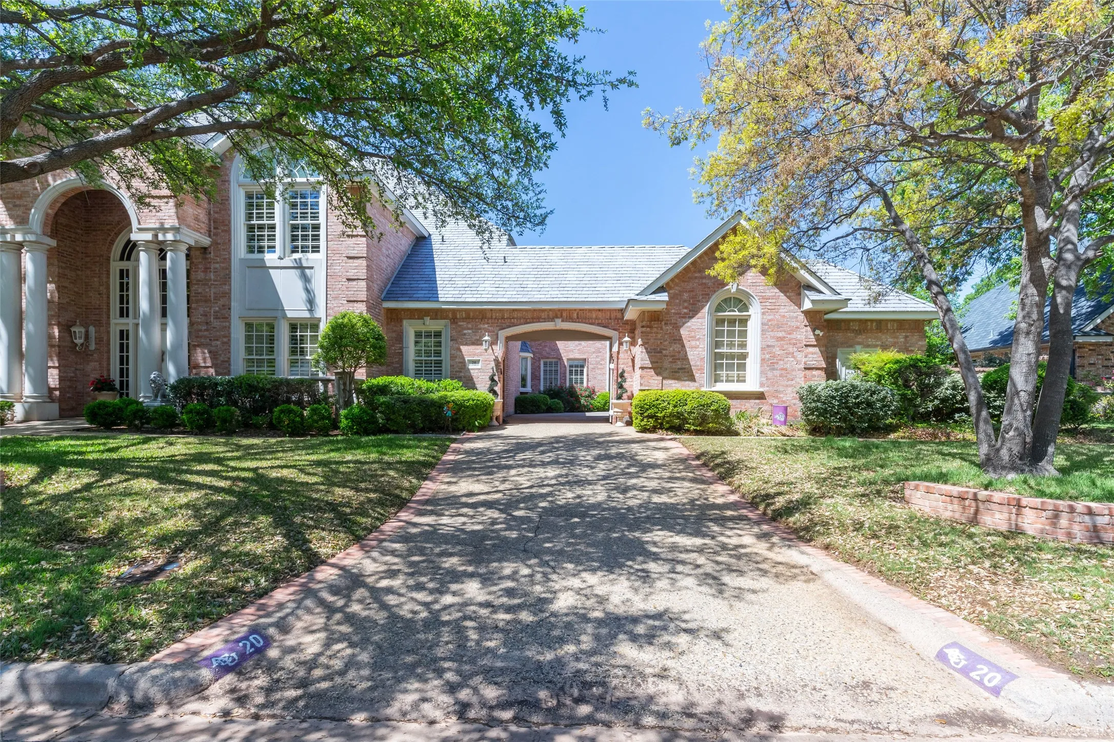 3 car garage plus golf cart garage.  Electric gate for added security.