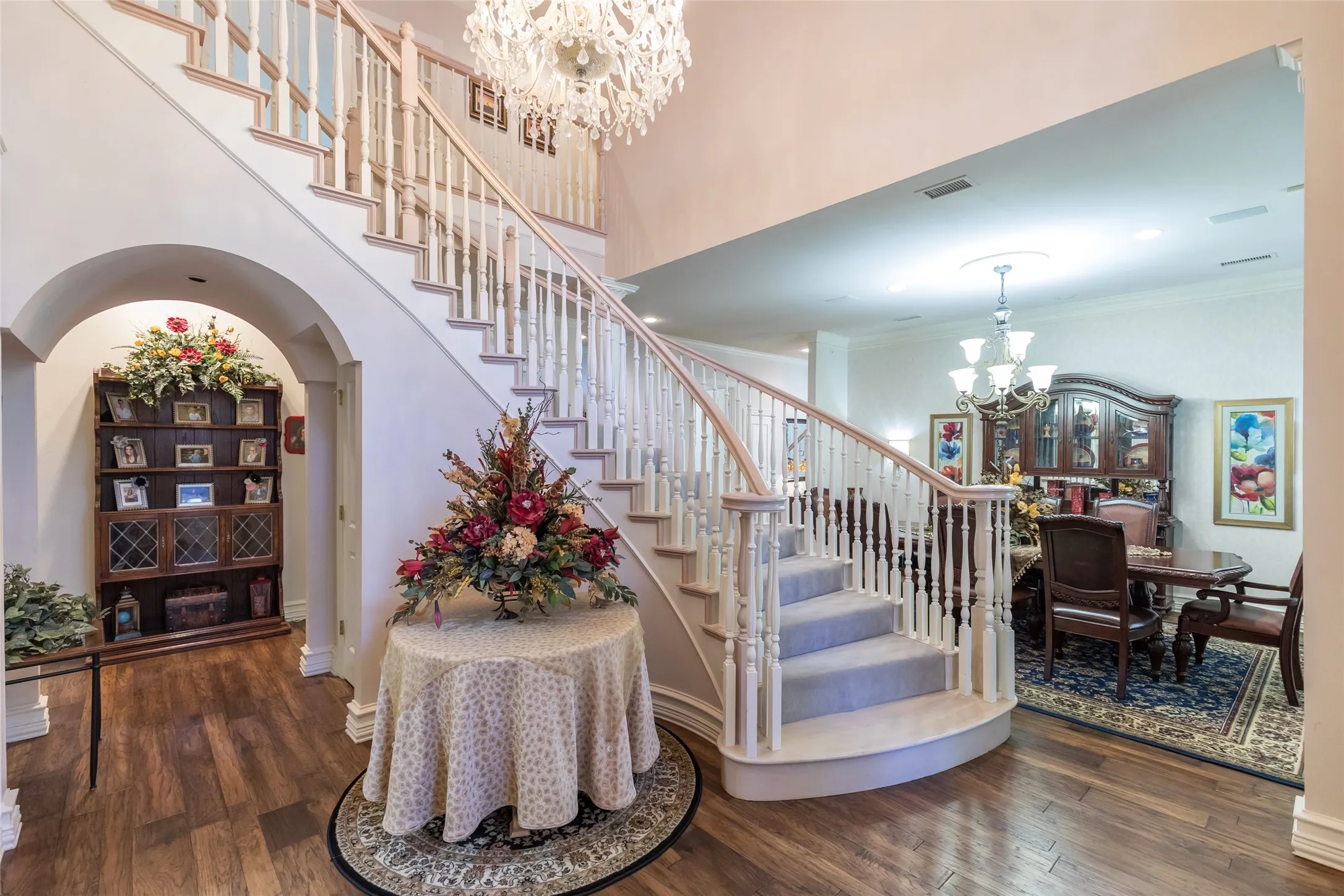 Spiral staircase leading up to 2nd floor!  Grand statement as you enter home!