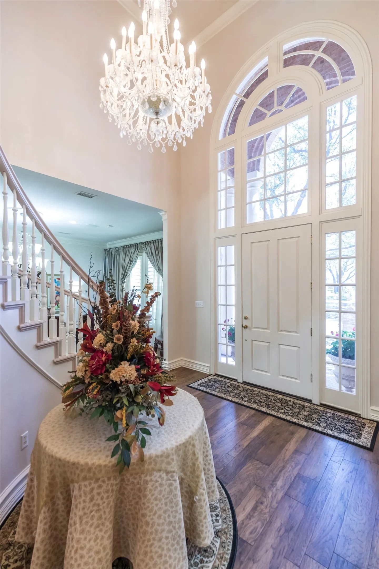 Inviting front entry!  Lots of natural light!  Elegant chandelier!  Timeless finishes!
