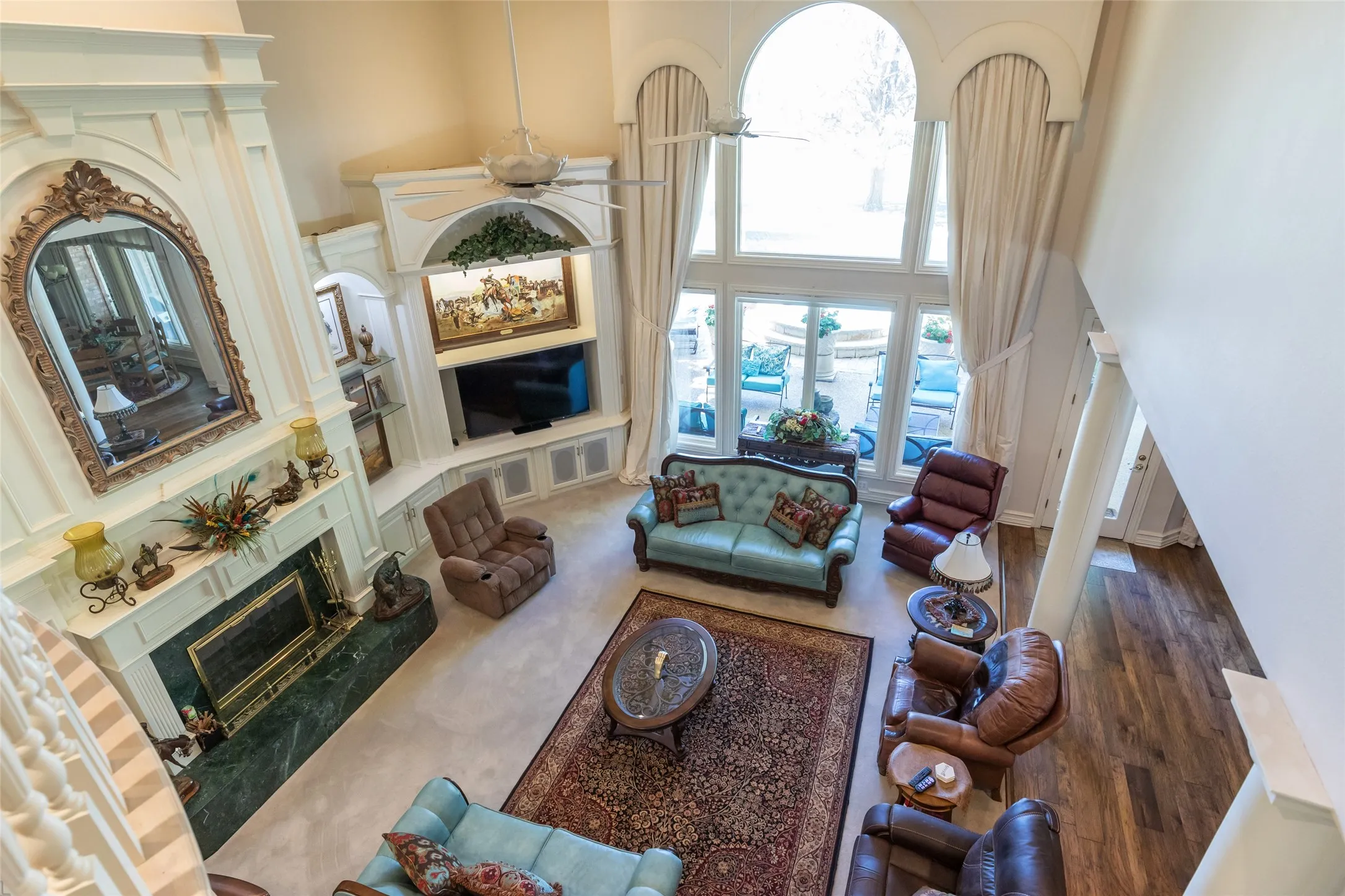 Grand overview of living room overlooking the golf course.