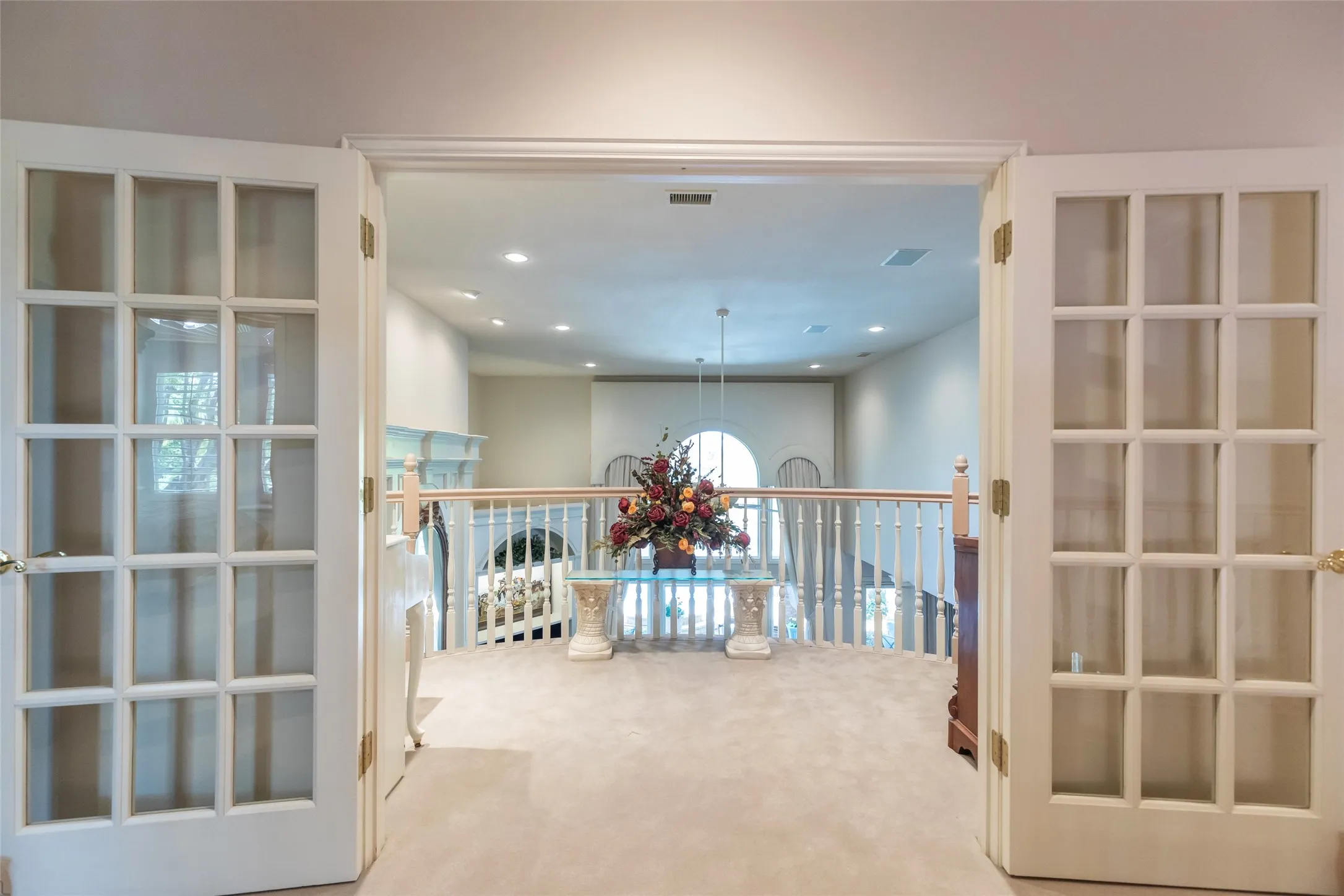 Juliet balcony at the top of the landing overlooking living room.