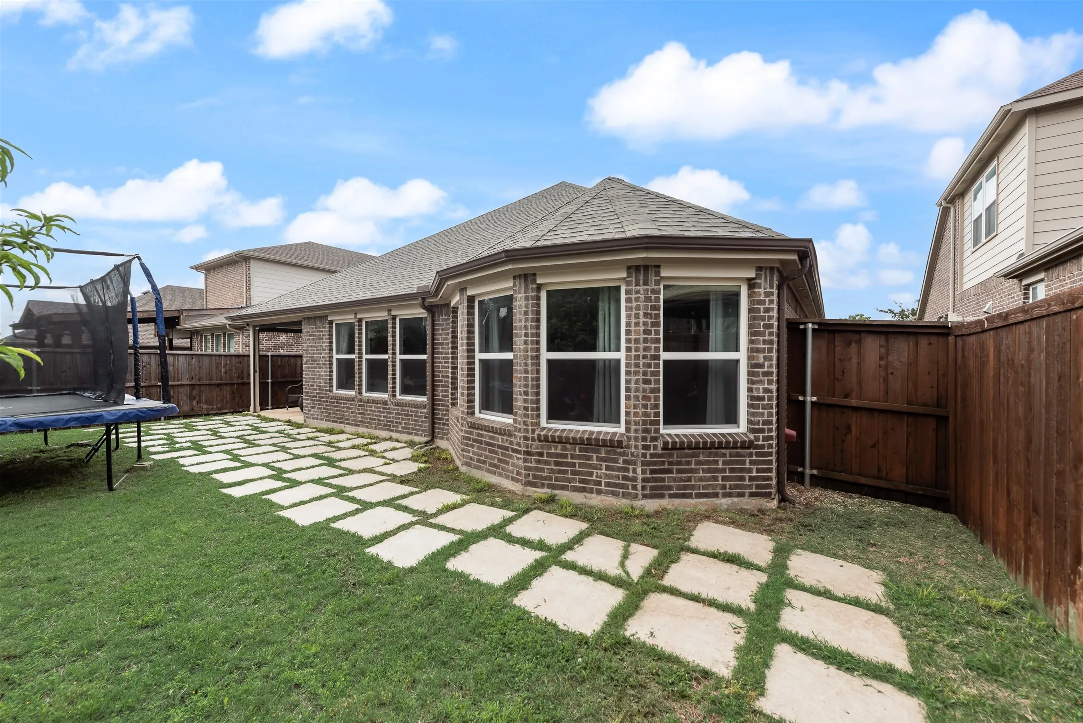 Backyard view of house at 1432 Westview Ln in the Canyon Falls community in Northlake, TX