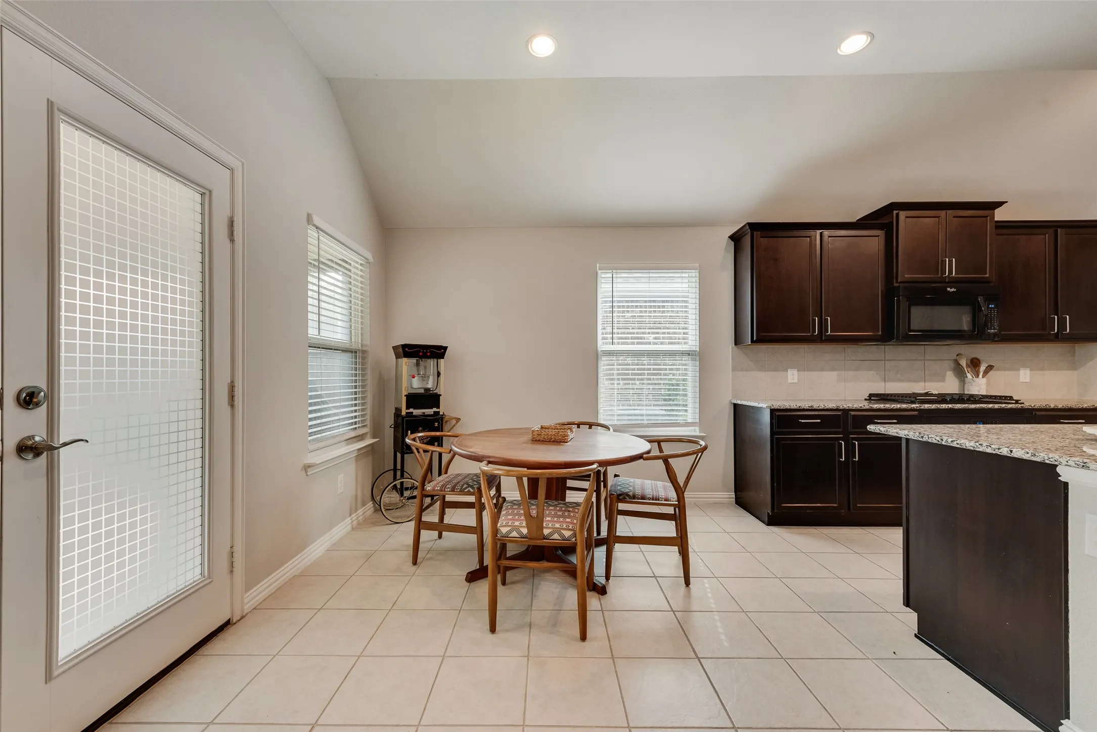 Dining area off of kitchen with ceramic tile floors at 1432 Westview Ln in the Canyon Falls community in Northlake, TX