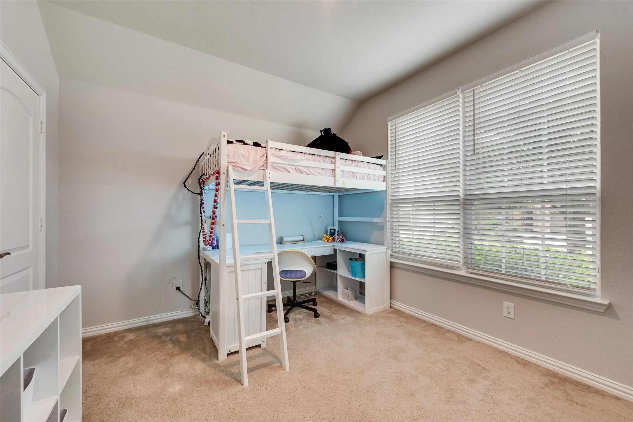 Front bedroom with large window at 1432 Westview Ln in the Canyon Falls community in Northlake, TX