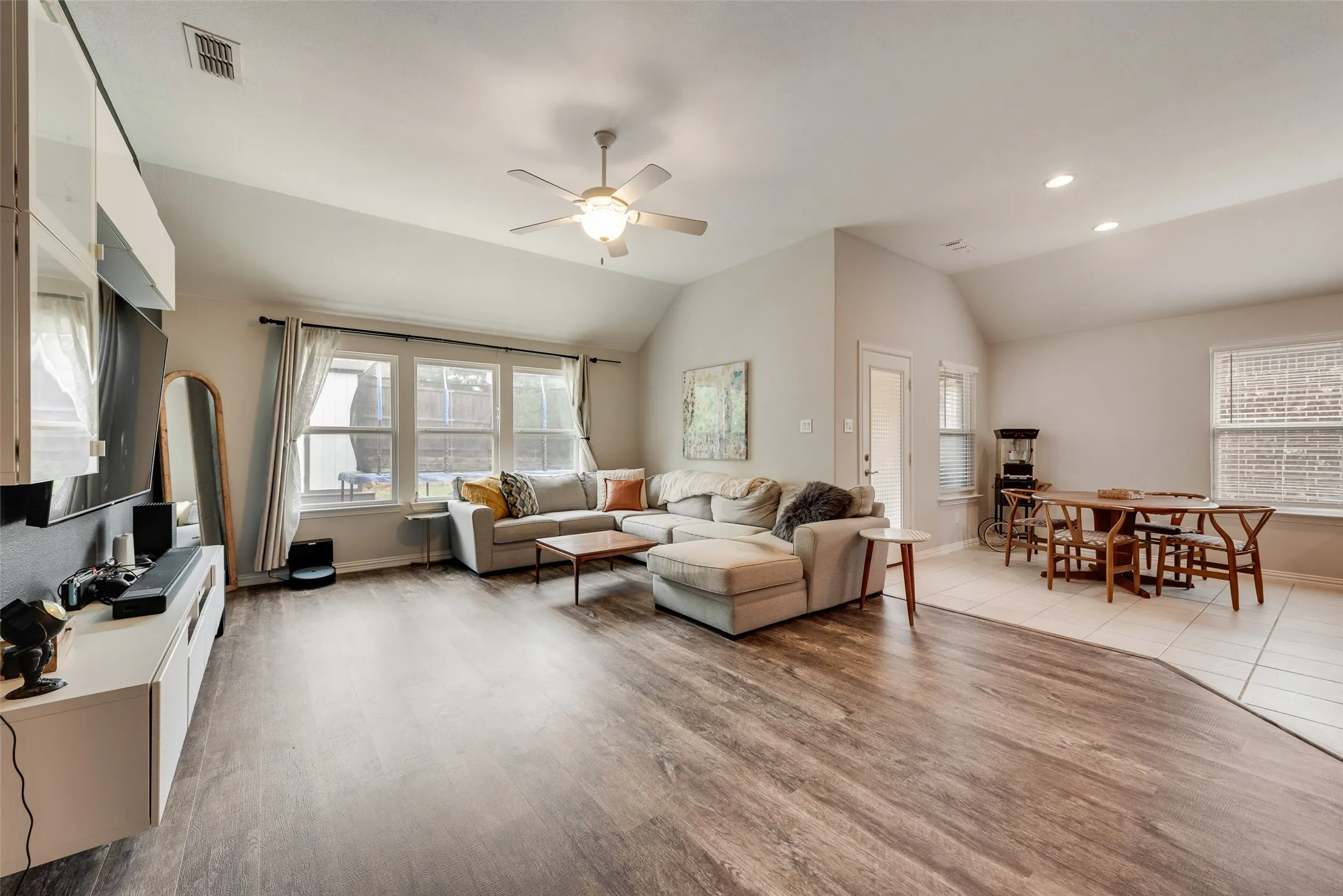 Open floor plan showing view into dining area from living room at 1432 Westview Ln in the Canyon Falls community in Northlake, TX