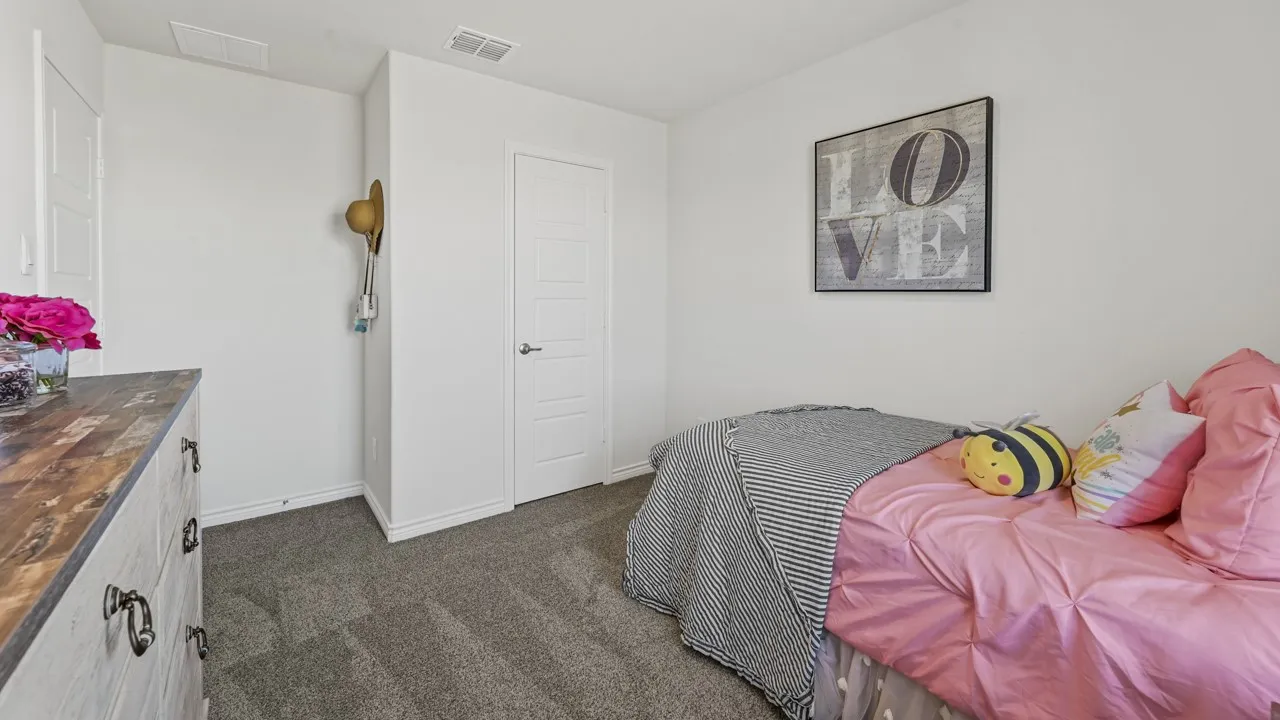 White painted walls with gray carpeting