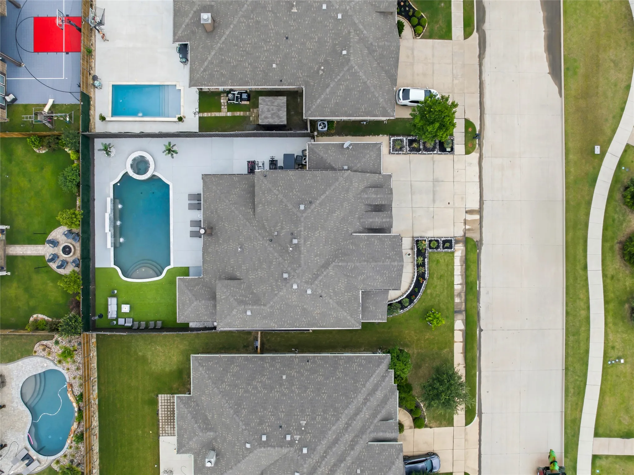 Aerial view of home and backyard.